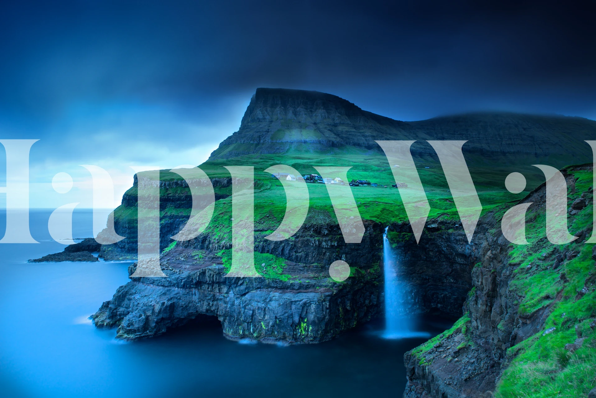 Mountain waterfall cascading into blue water, green cliffs, dramatic sky wallpaper