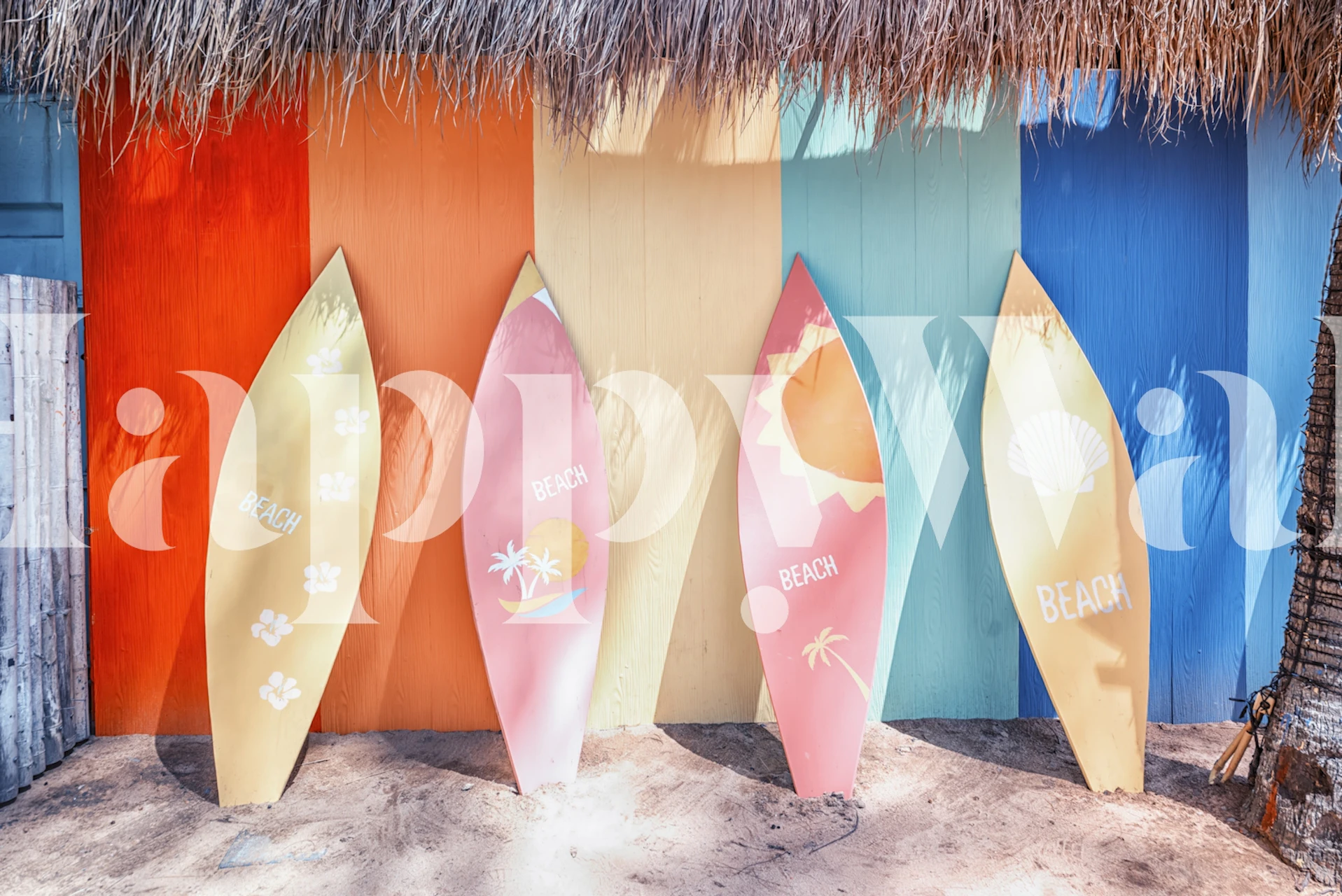 Colorful surfboards against a bright beach wall mural