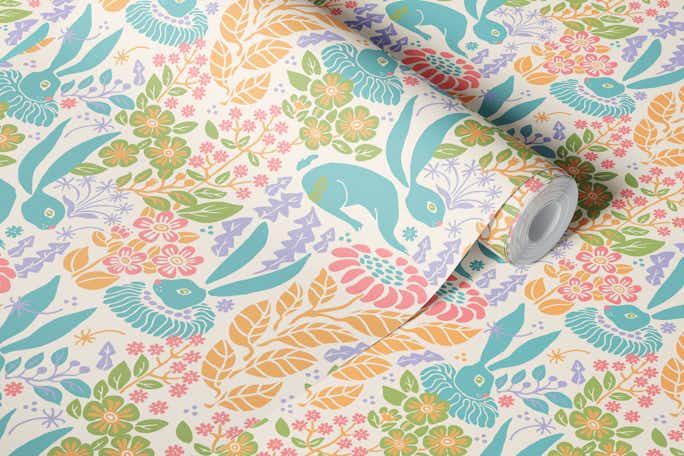 Blue rabbits in a whimsical gardenwallpaper roll