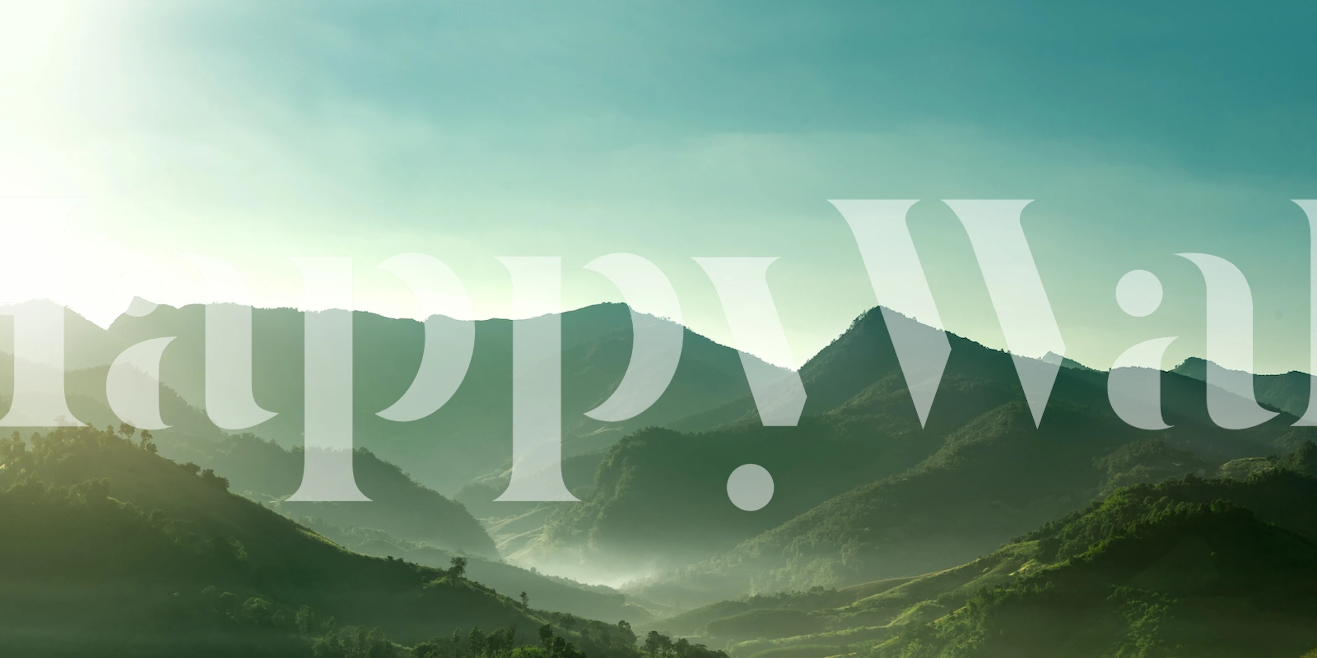 Serene mountain landscape in green tones wallpaper