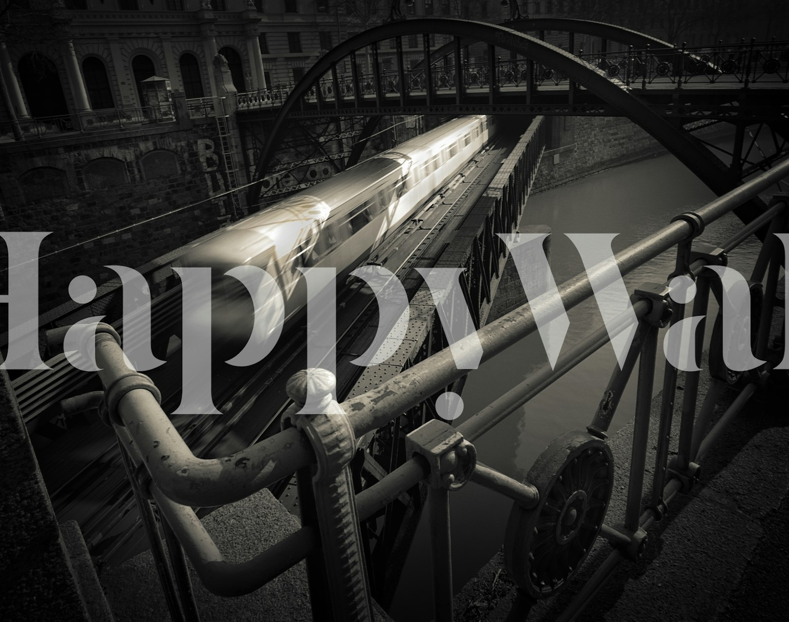 Black and white urban scene with a moving train wallpaper