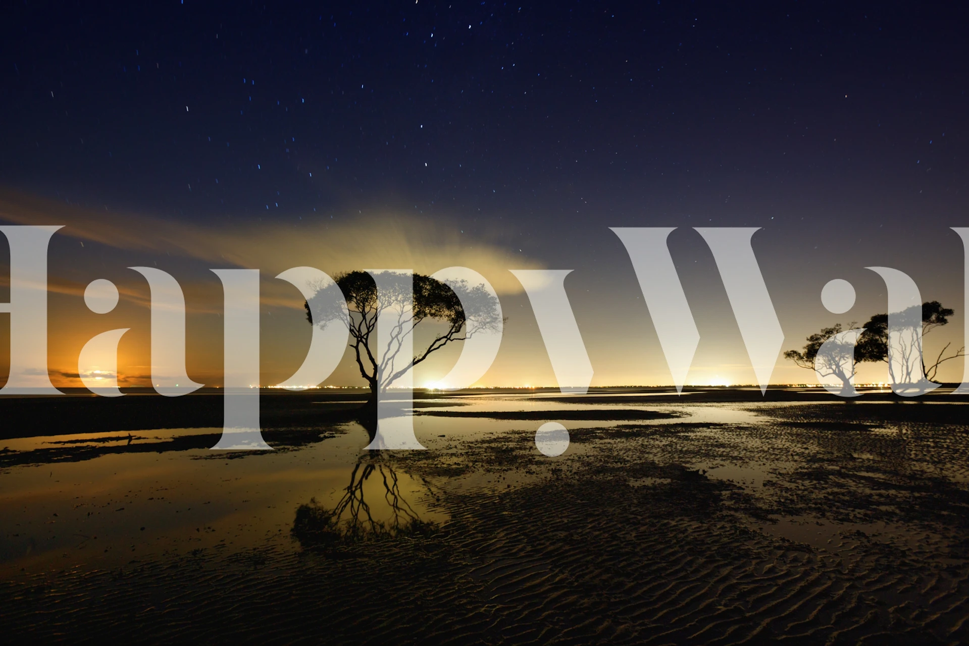 A serene night sky with trees and reflecting water wallpaper