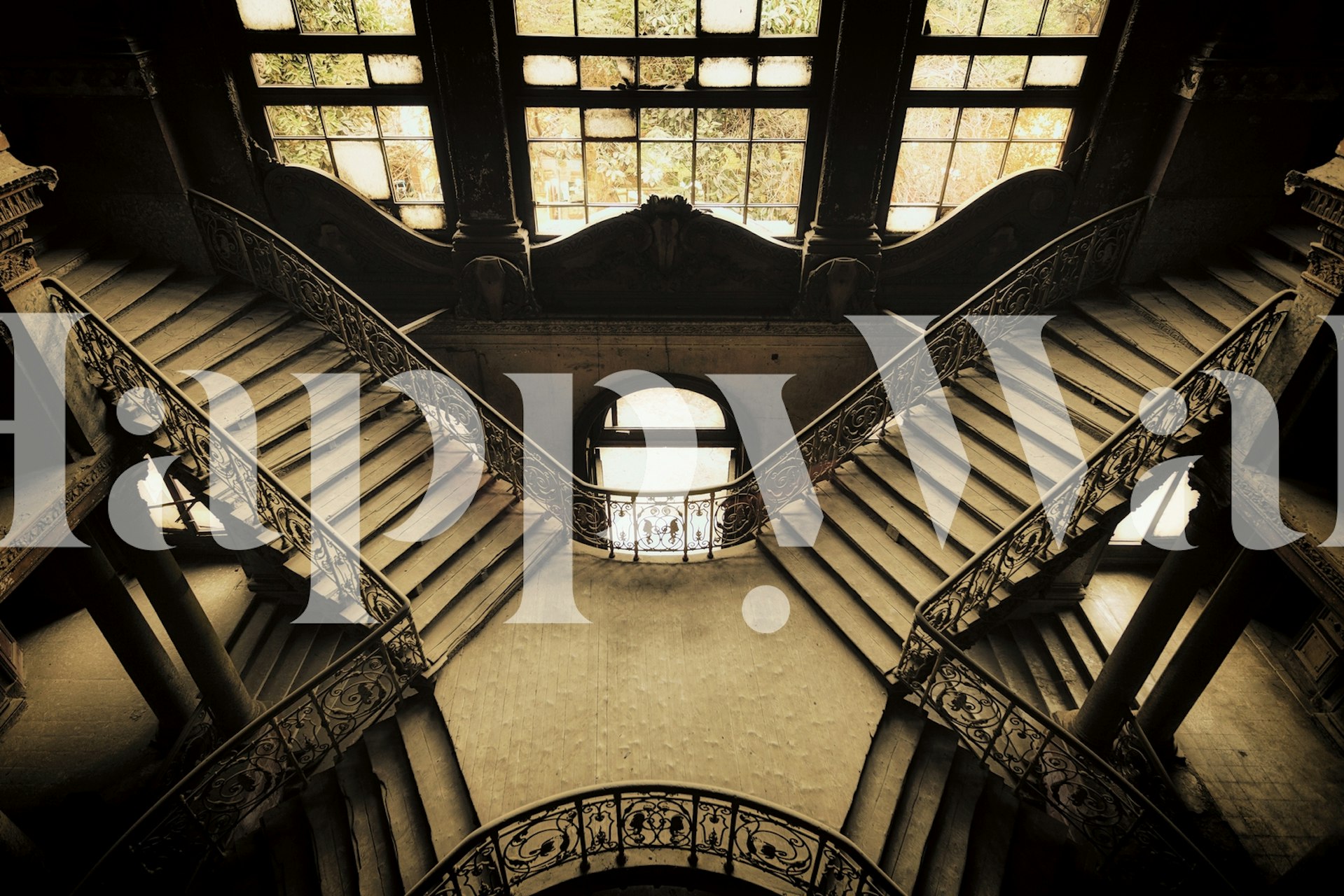 Majestic staircases of a grand abandoned palace in sepia tones, creating an aura of historical elegance.