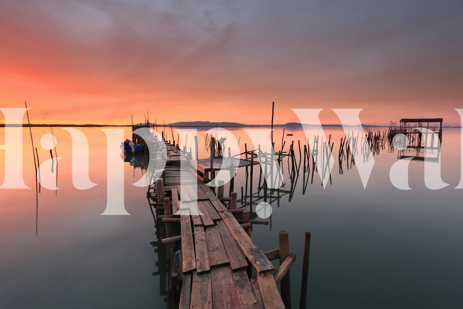 Serene wooden pier reflected in calm water at sunrise wallpaper