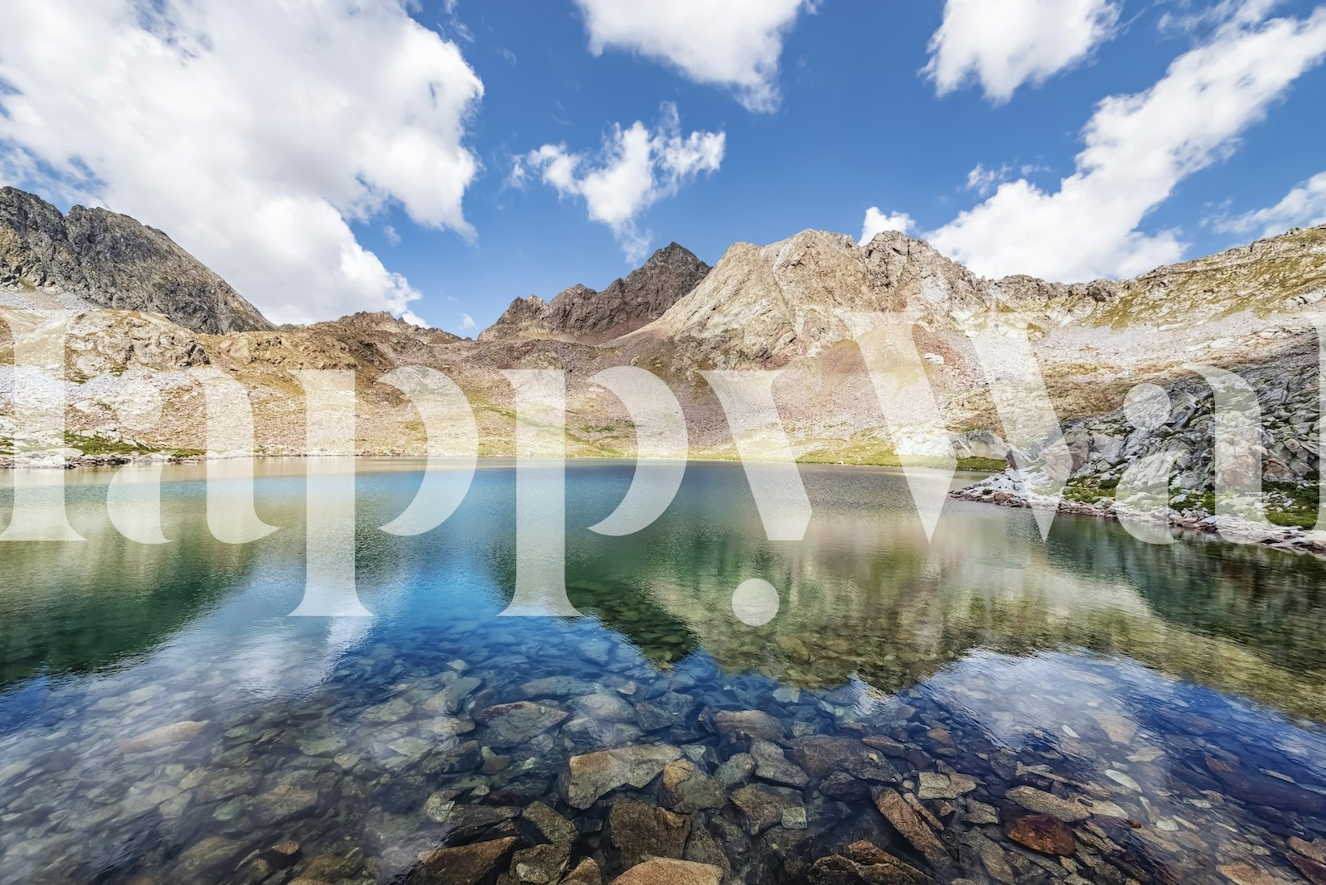 Mountain landscape reflecting in calm blue lake wallpaper