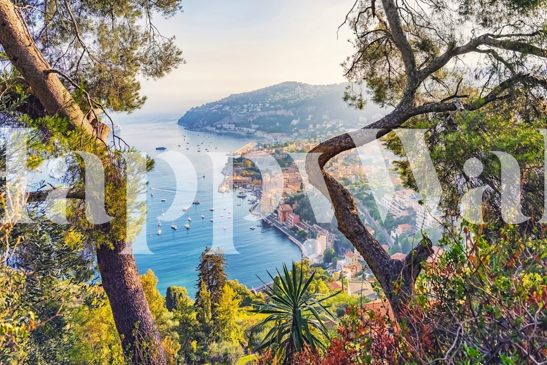 Scenic coastal view wallpaper with lush trees and blue sea