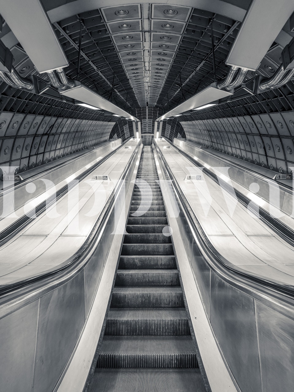 Subway escalator view in black and white wallpaper
