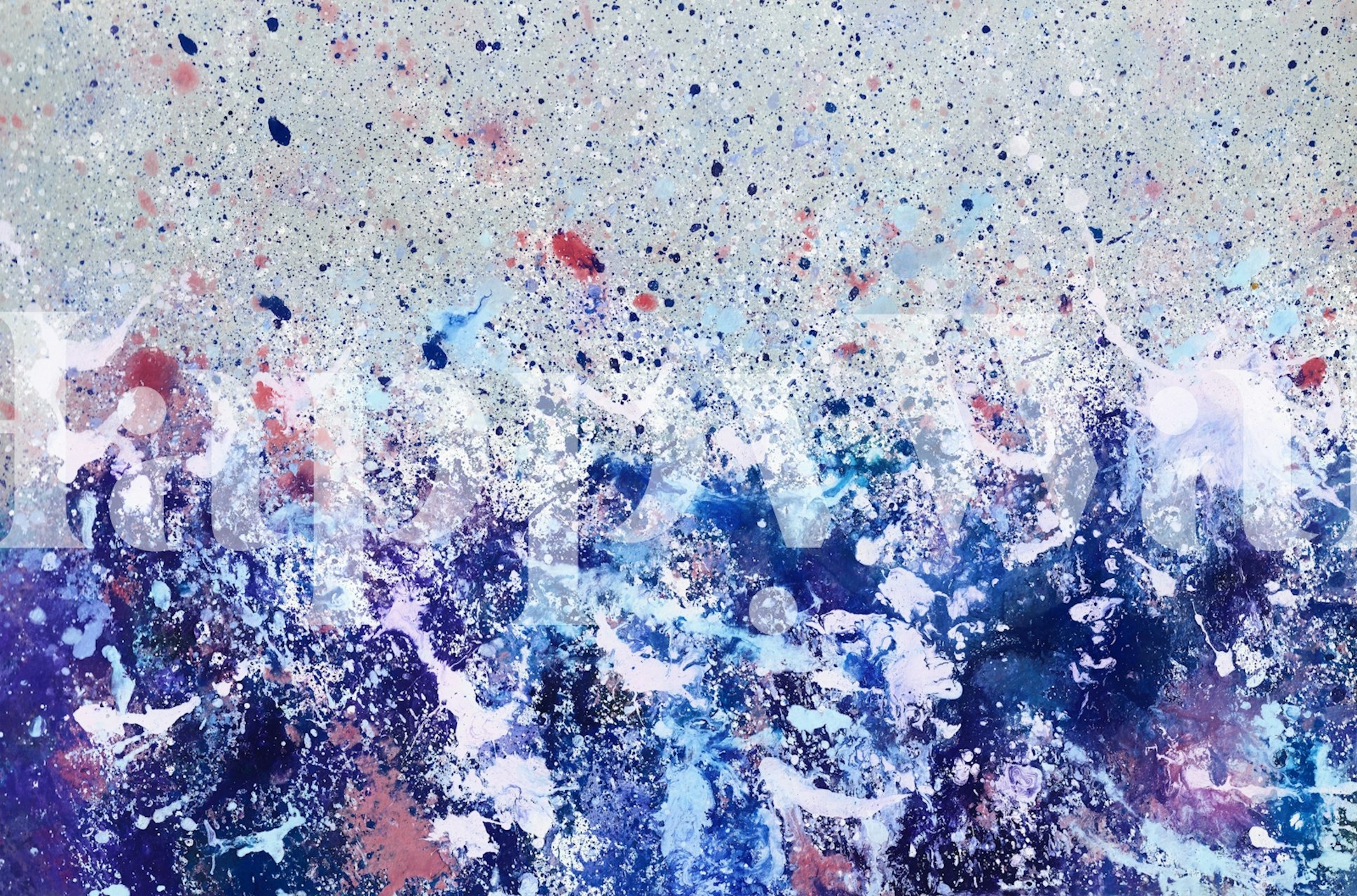 Colorful ink splashes wallpaper in a room