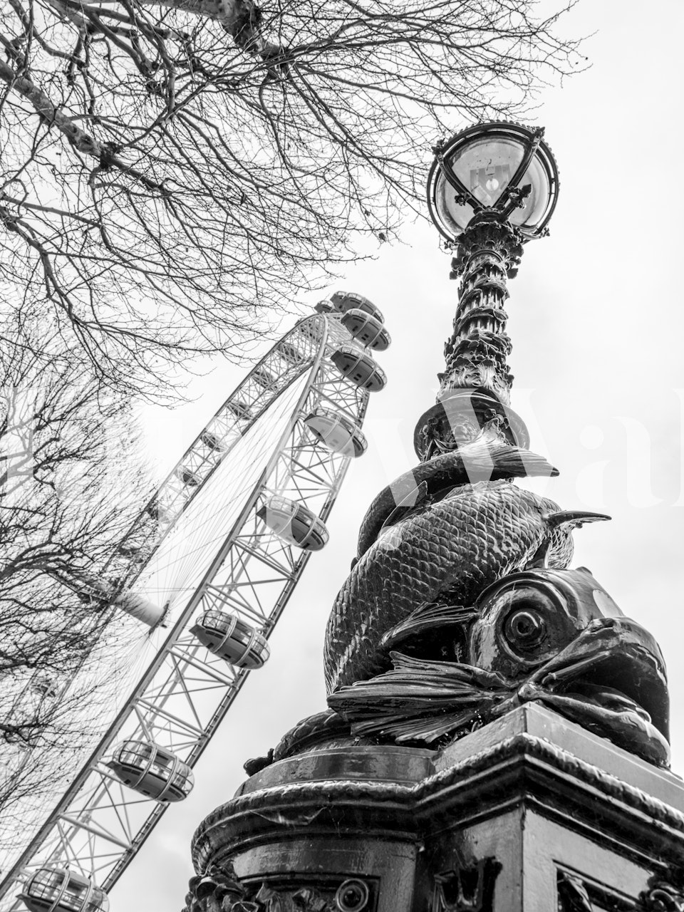 Black and white wall mural featuring the London Eye Ferris wheel and an ornate street lamp