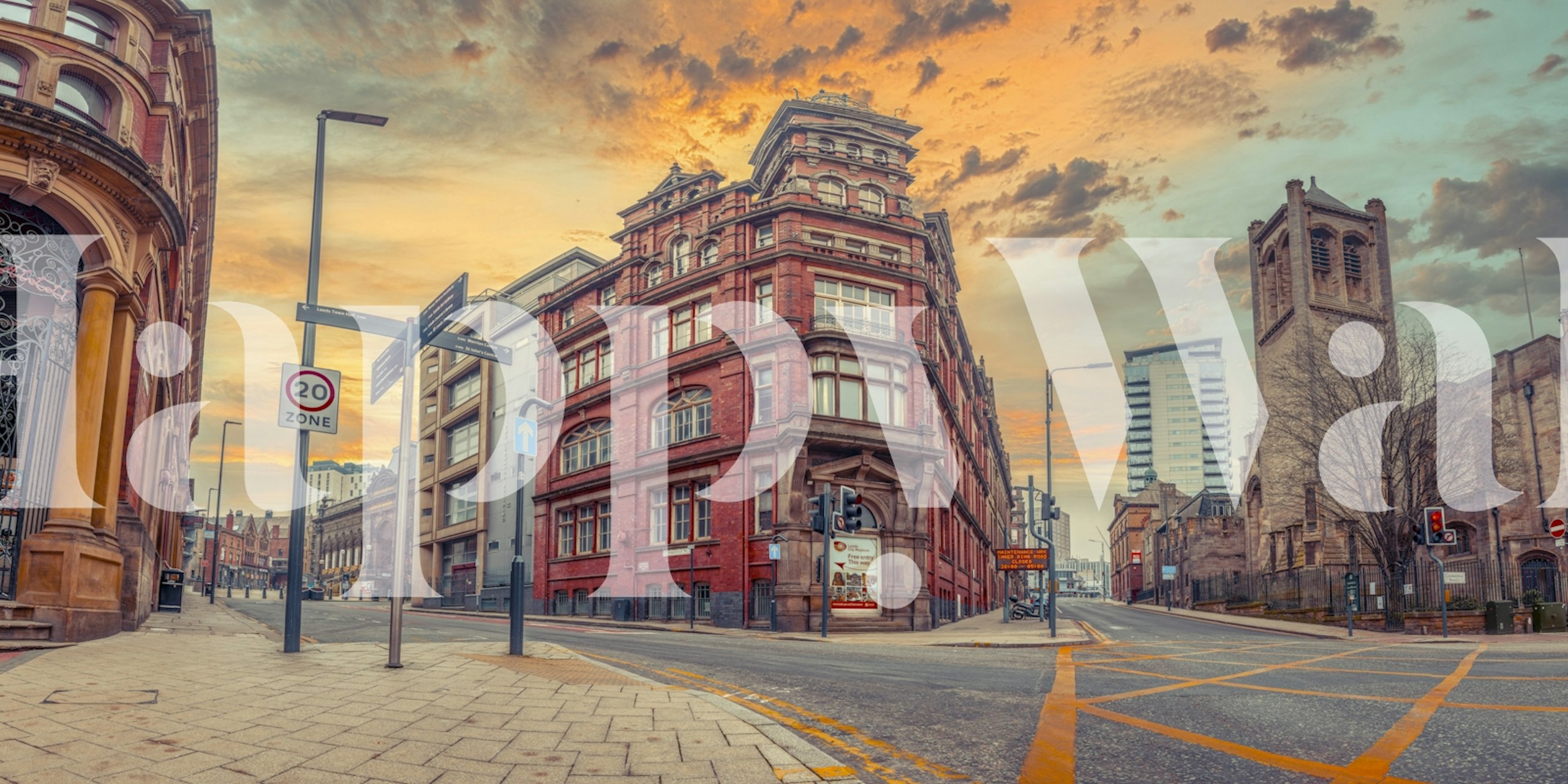 Vintage red brick buildings with a cloudy sky wallpaper