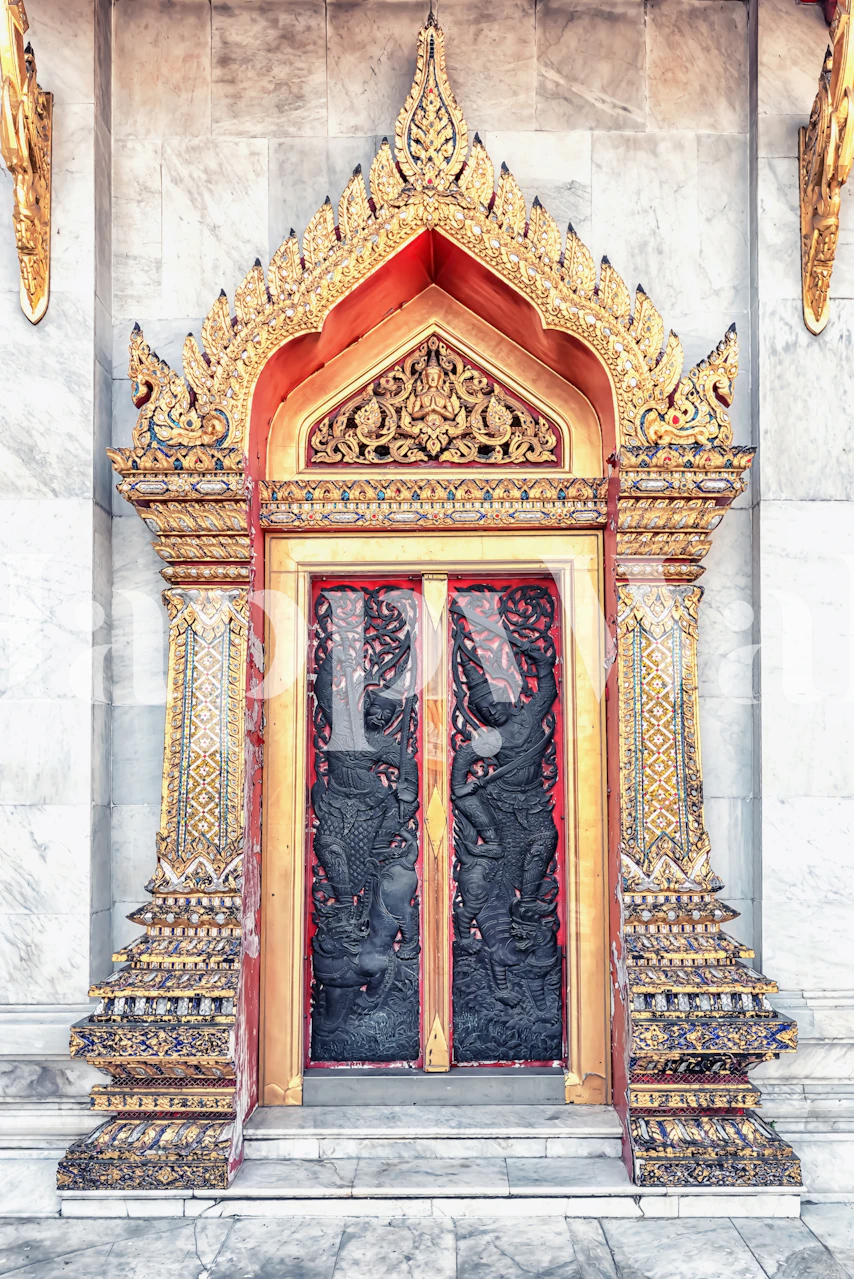 Intricately carved golden door design with black accents wallpaper