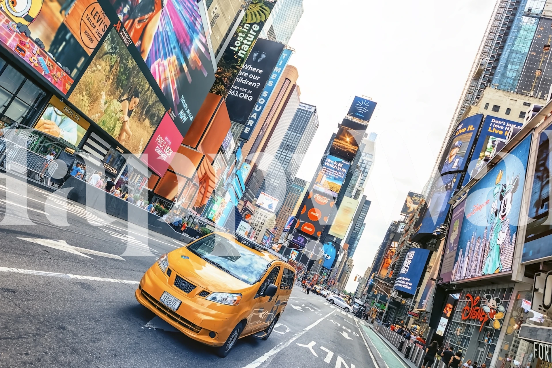 Vibrant urban scene of Times Square with colorful billboards and a yellow taxi wall mural