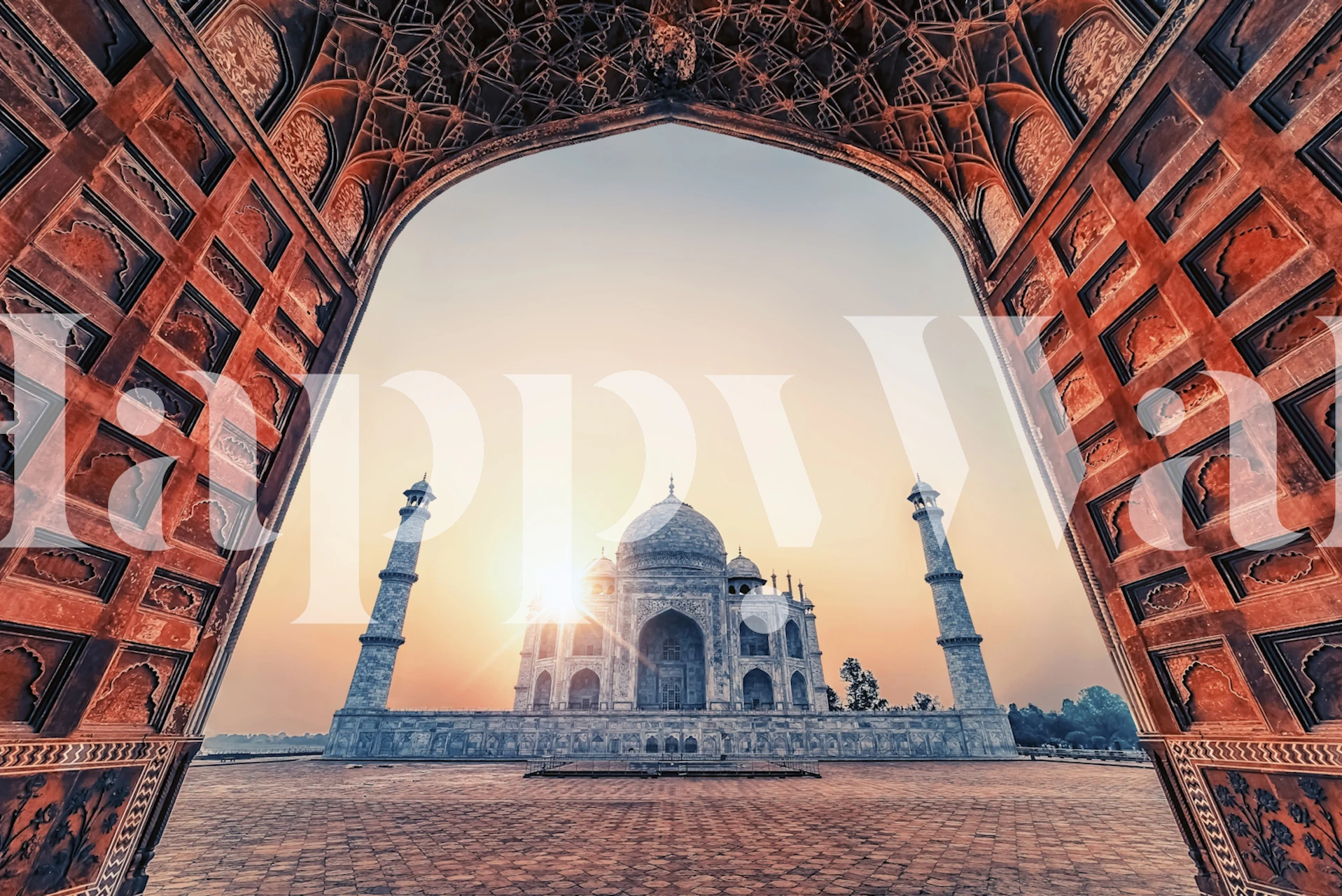 First Lights -seinämaalaus, jossa auringonnousu ikonisen arkkitehtuurin takana