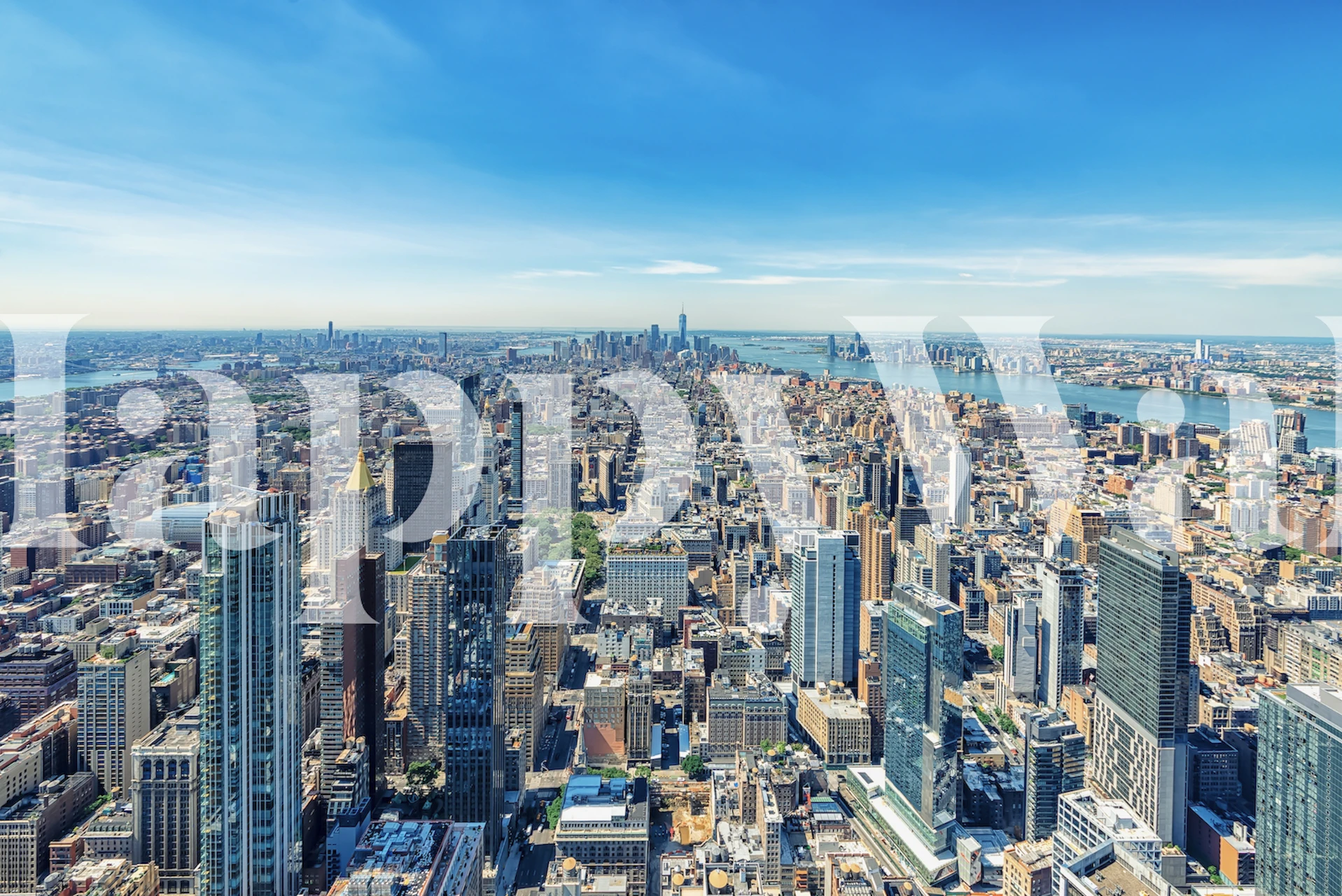 Aerial view of Manhattan skyline with blue sky wallpaper