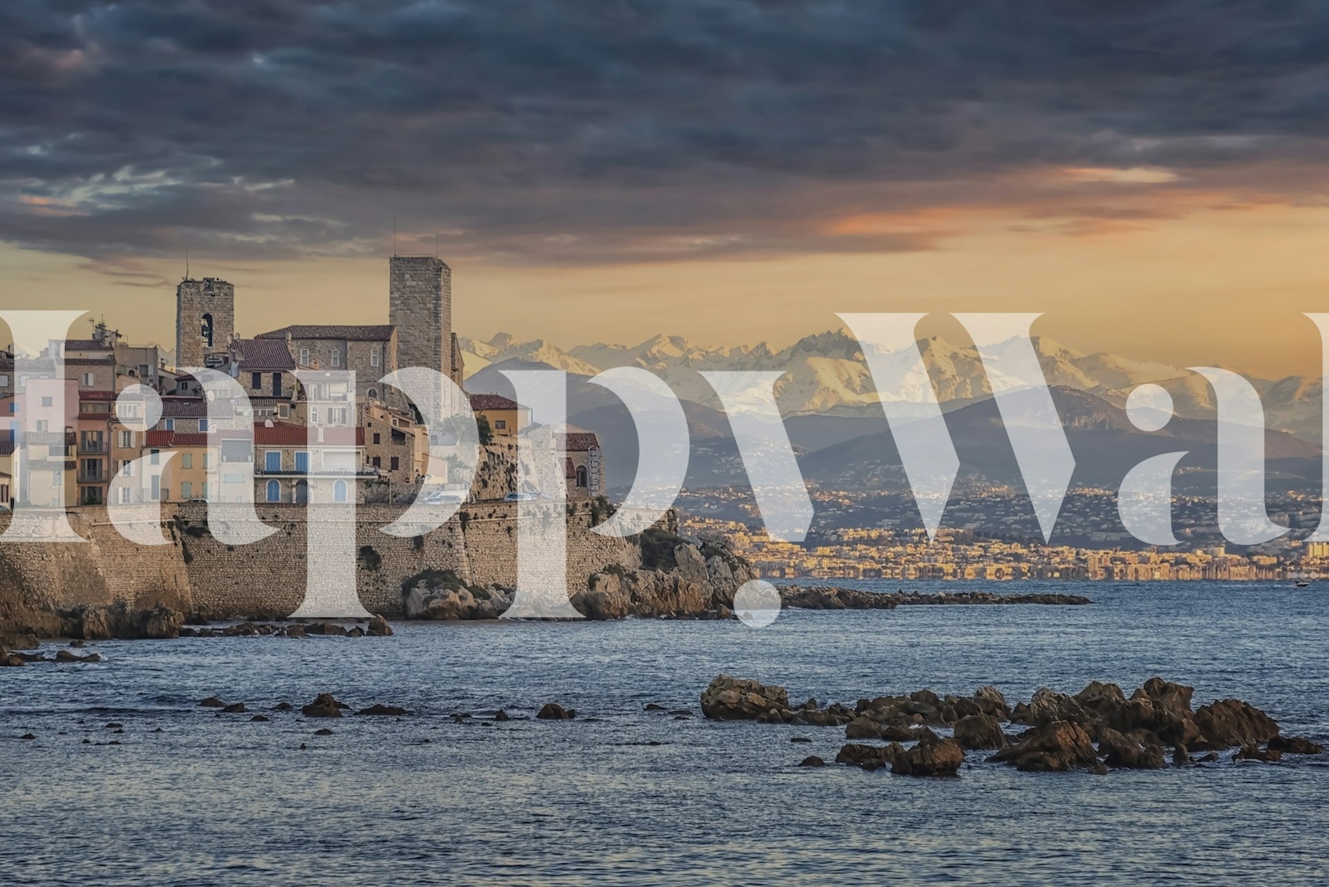 Coastal village view with mountains and water; blue and beige colors; scenic wallpaper