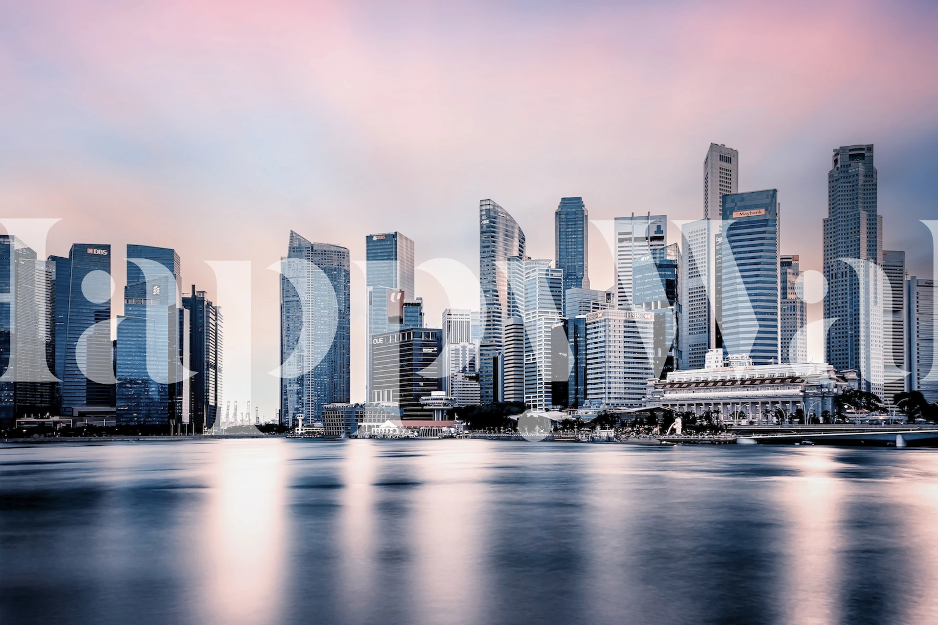 City skyline at sunset with blue and pink hues wallpaper
