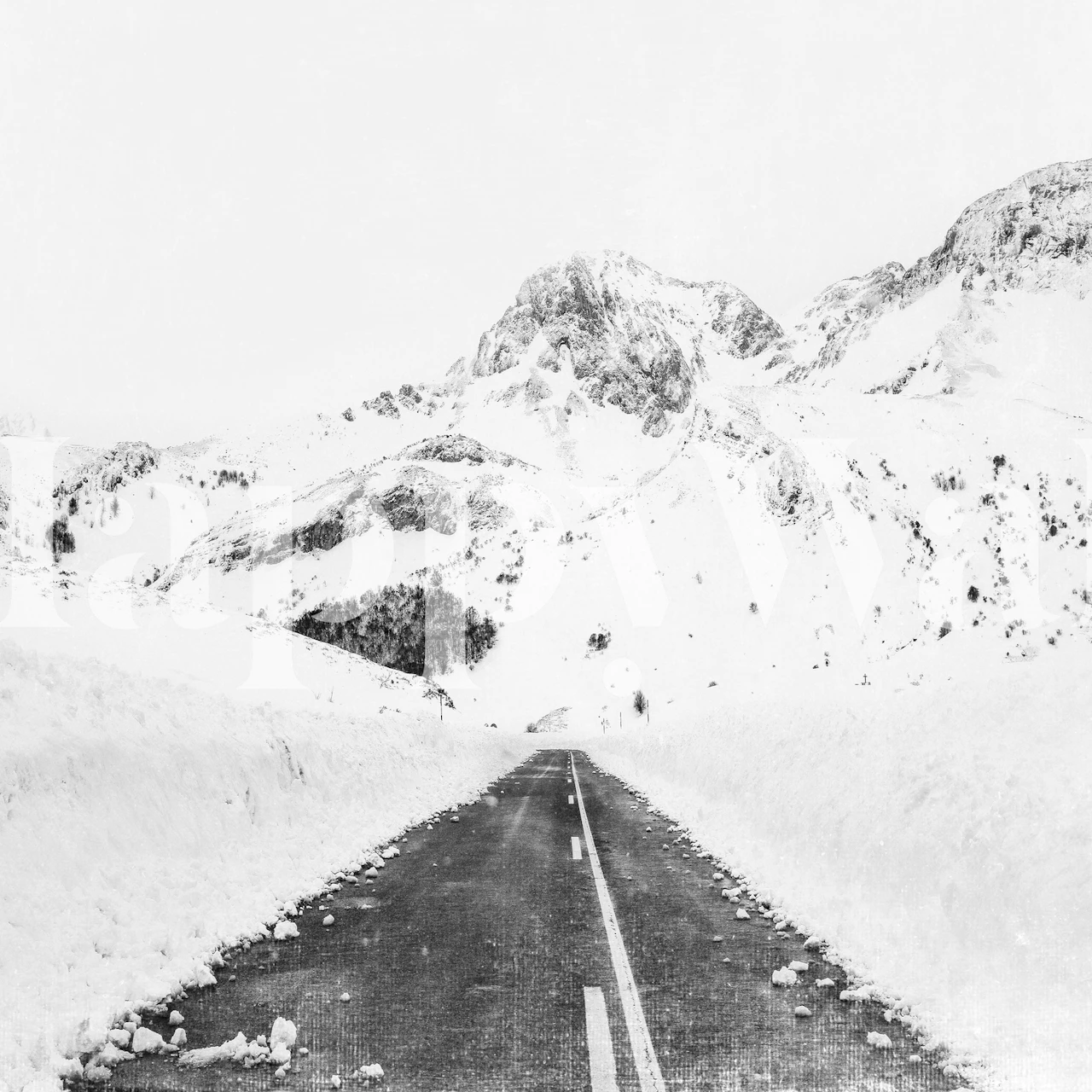 Black and white snowy mountains with a road wallpaper