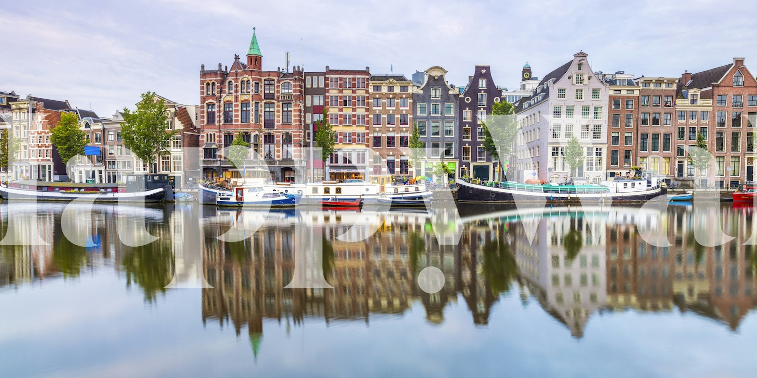 Amsterdam cityscape reflection on calm water in muted colors wallpaper