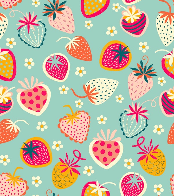 happy tossed strawberries on light blue