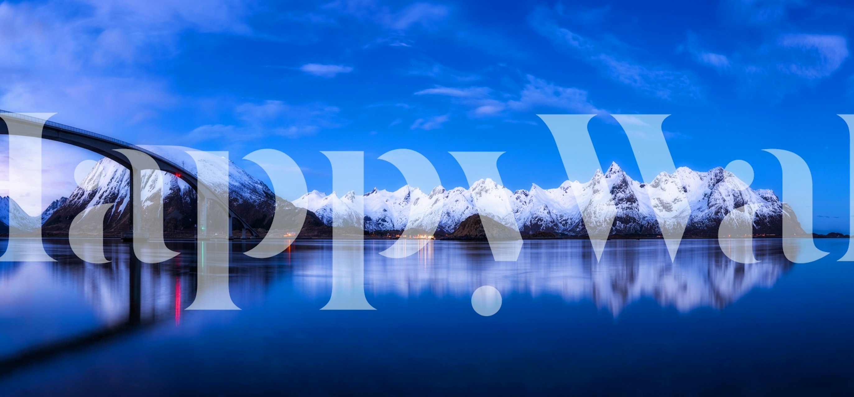 Lofoten mountain landscape with blue sky and reflective water wallpaper