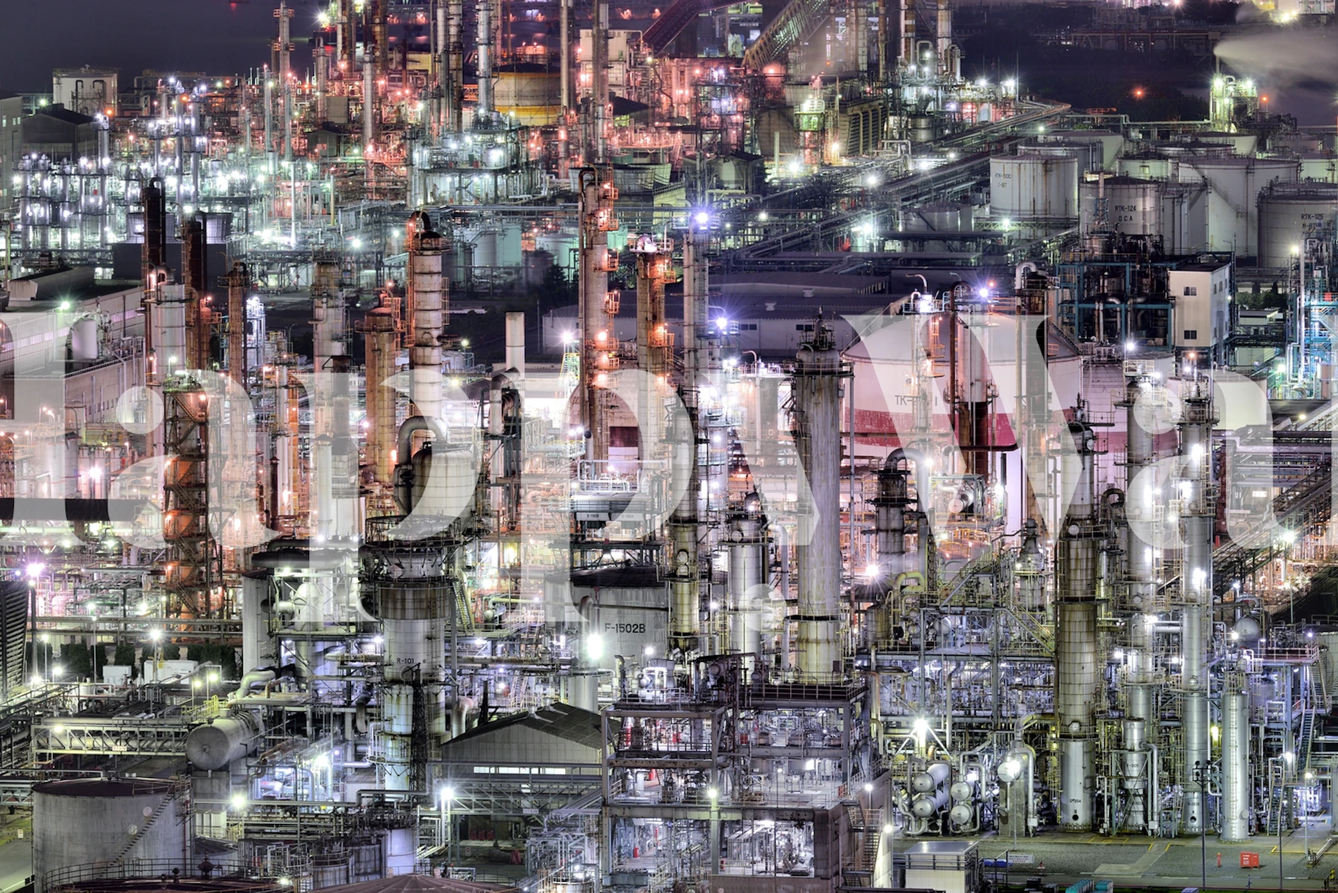 Industrial scene with illuminated structures in various colors wallpaper