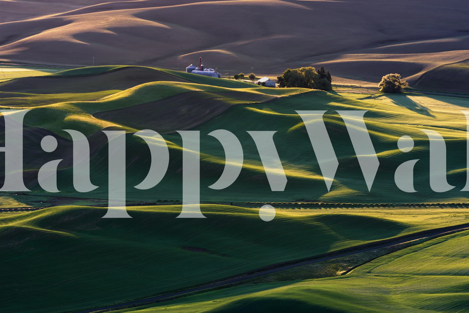 Wall mural of rolling green hills at sunset, providing a peaceful and serene countryside view.