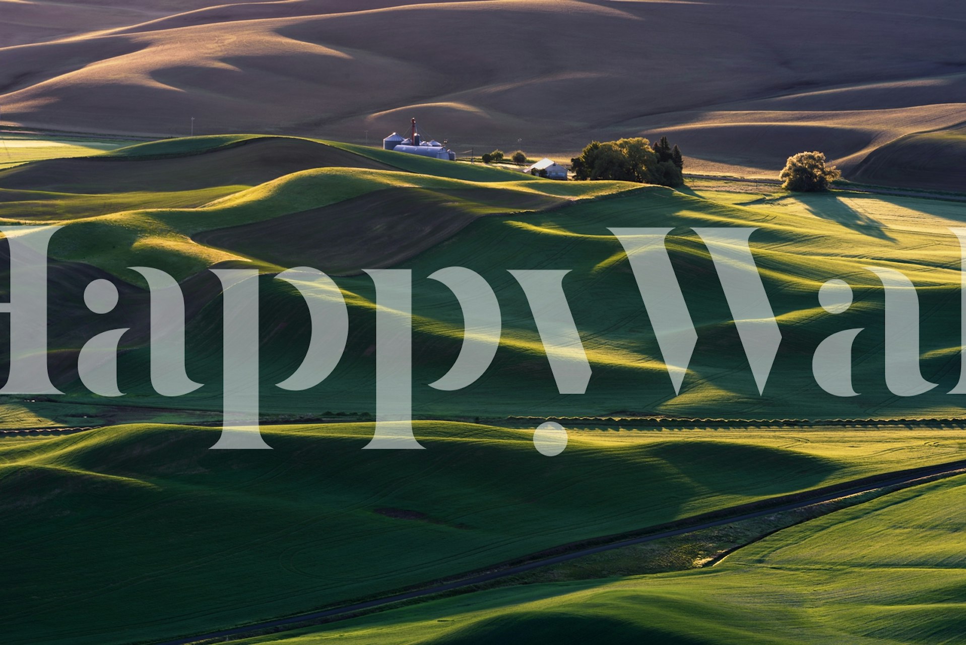 Wall mural of rolling green hills at sunset, providing a peaceful and serene countryside view.