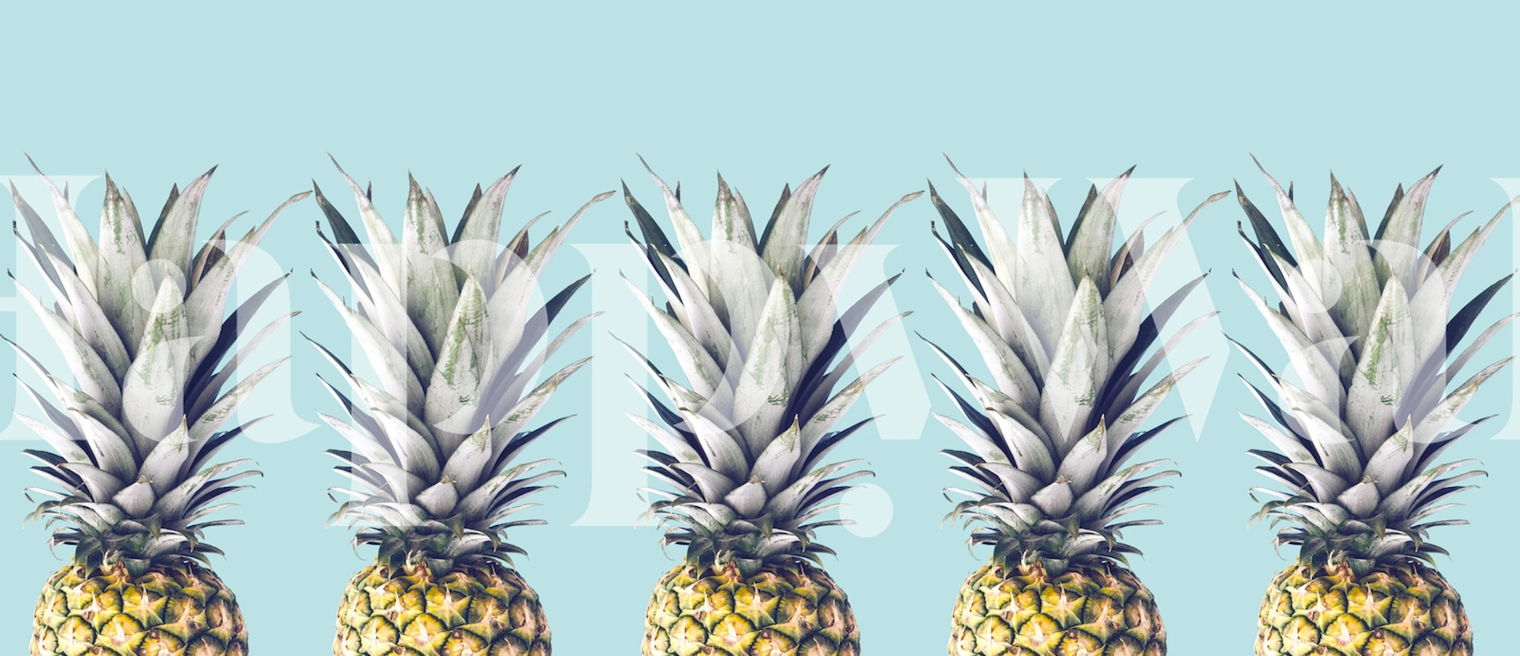 Stylized pineapples on a pastel blue background wall mural