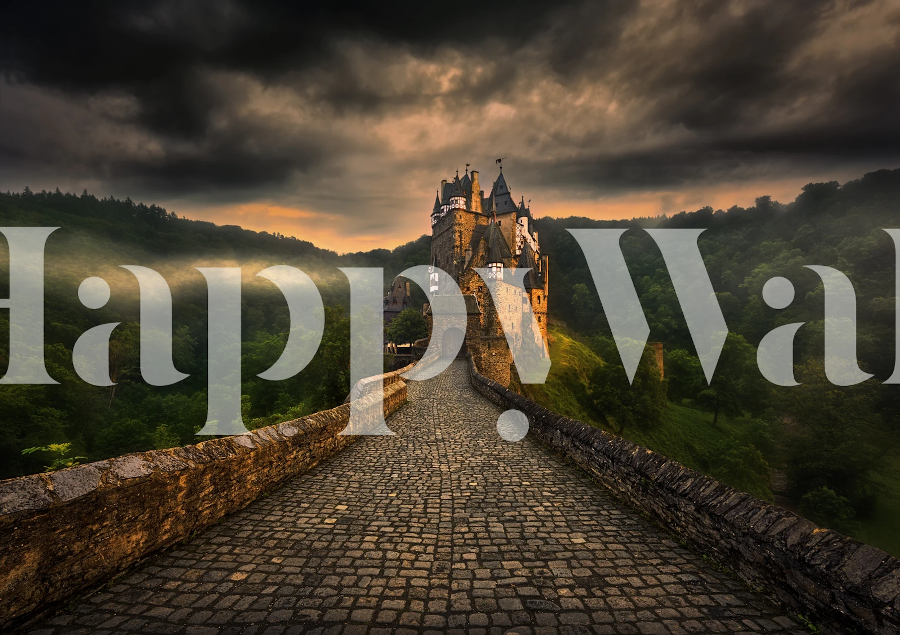 Castle landscape wallpaper with dramatic skies and lush greenery