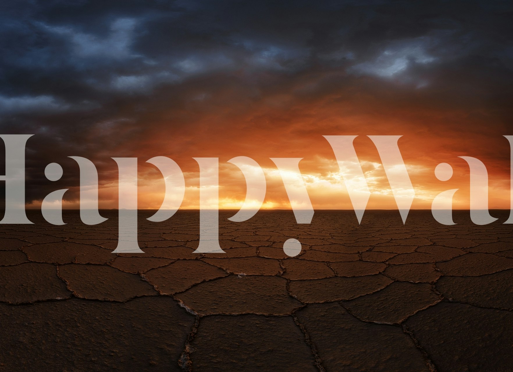 Vibrant sunset over cracked earth wallpaper