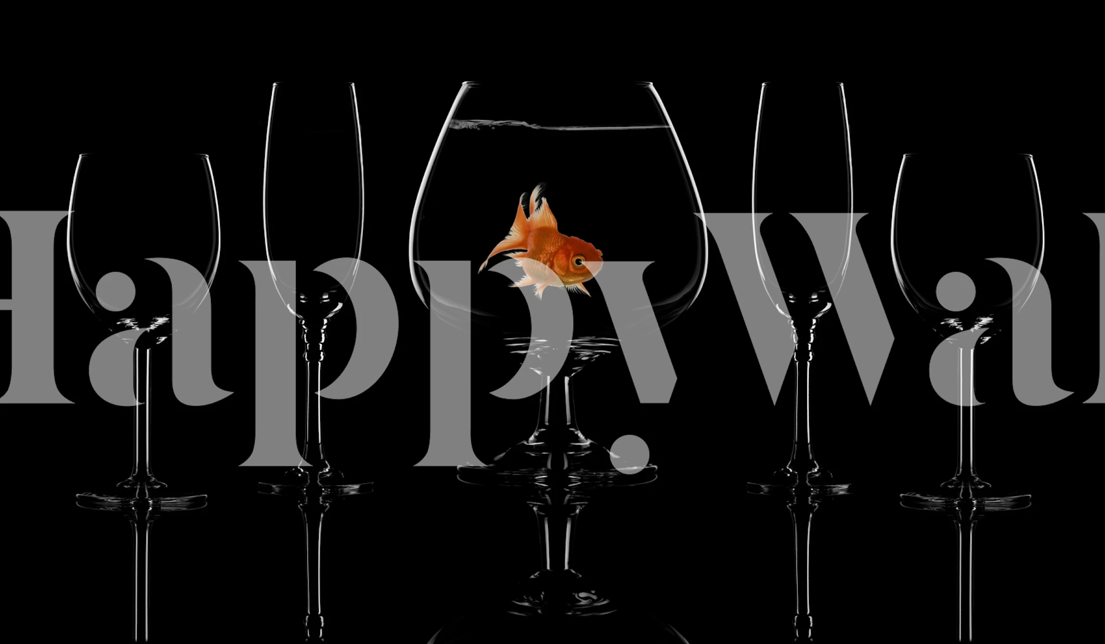 Goldfish in glass bowl surrounded by empty wine glasses wallpaper