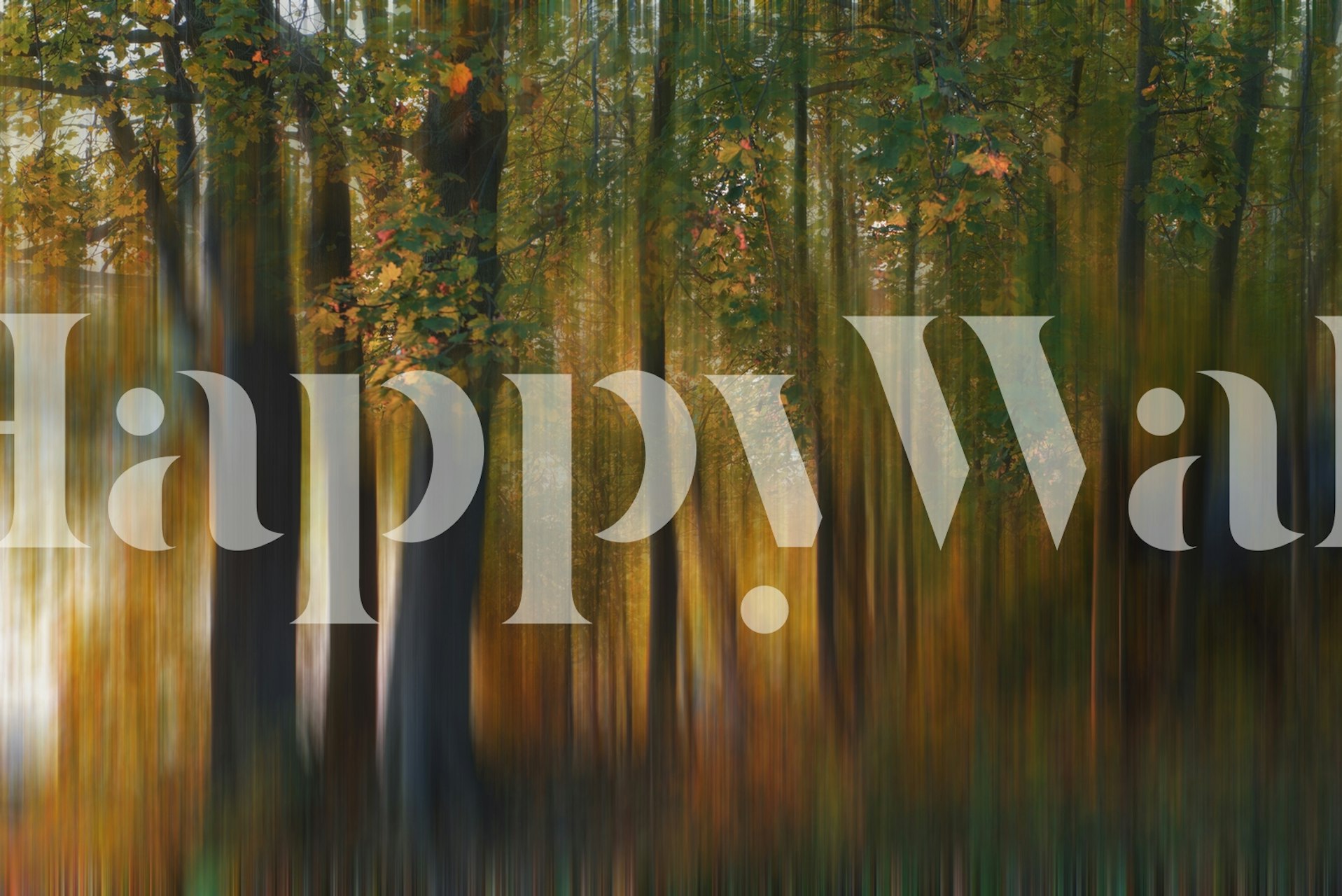 Fall forest with blurred trees in warm colors wallpaper