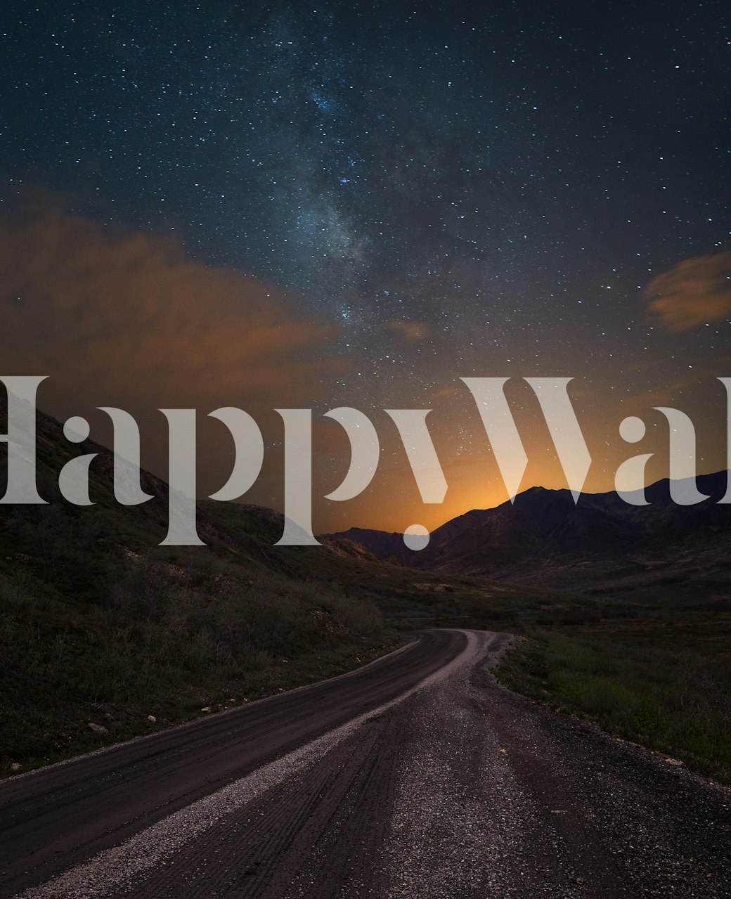 Winding dirt road under a starry night sky wallpaper