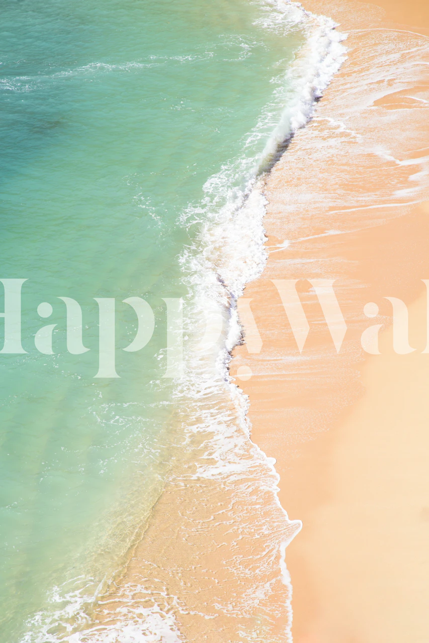 Blue ocean waves meeting sandy beach wallpaper