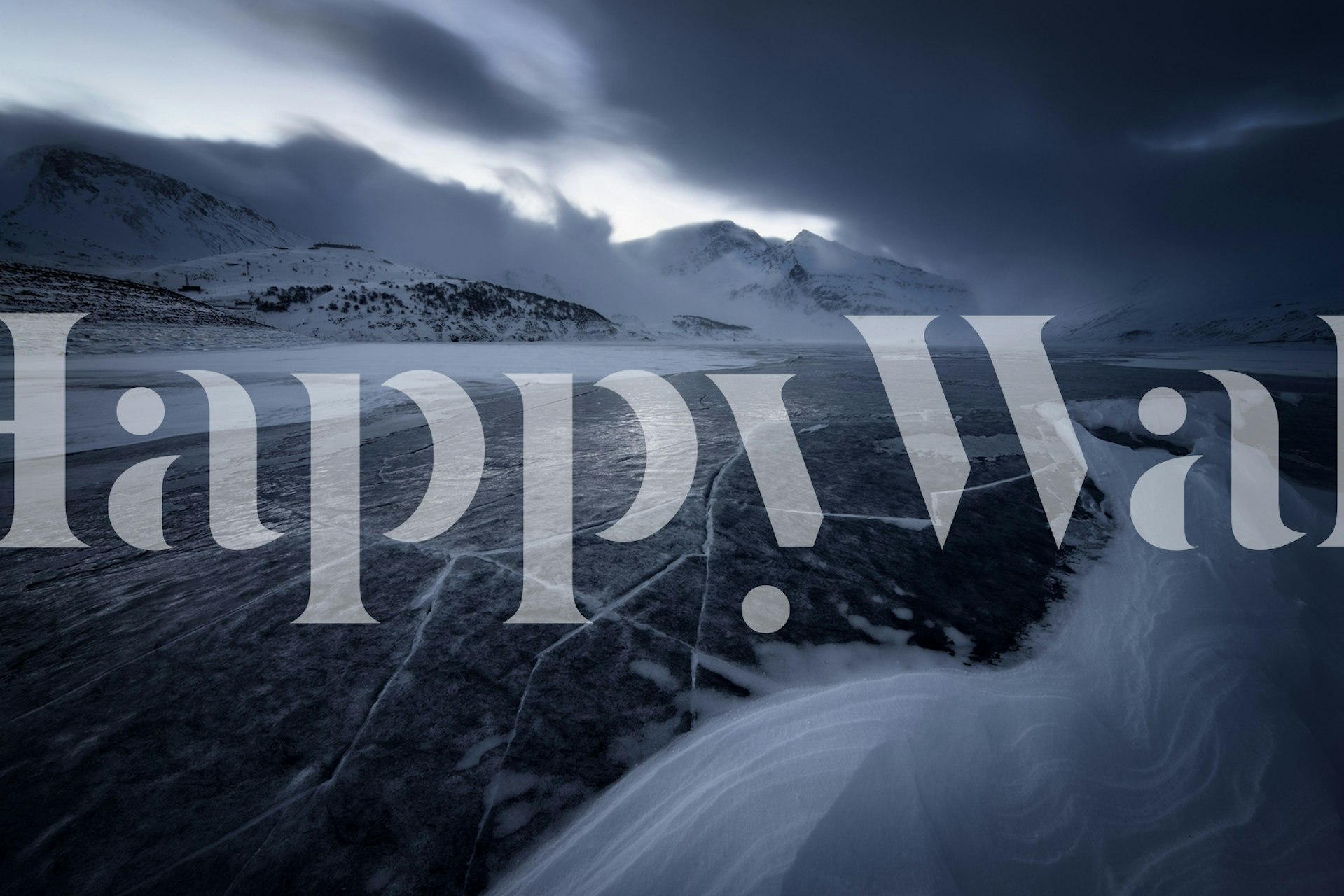 Ice landscape with dark blues, grays, and white patterns wallpaper