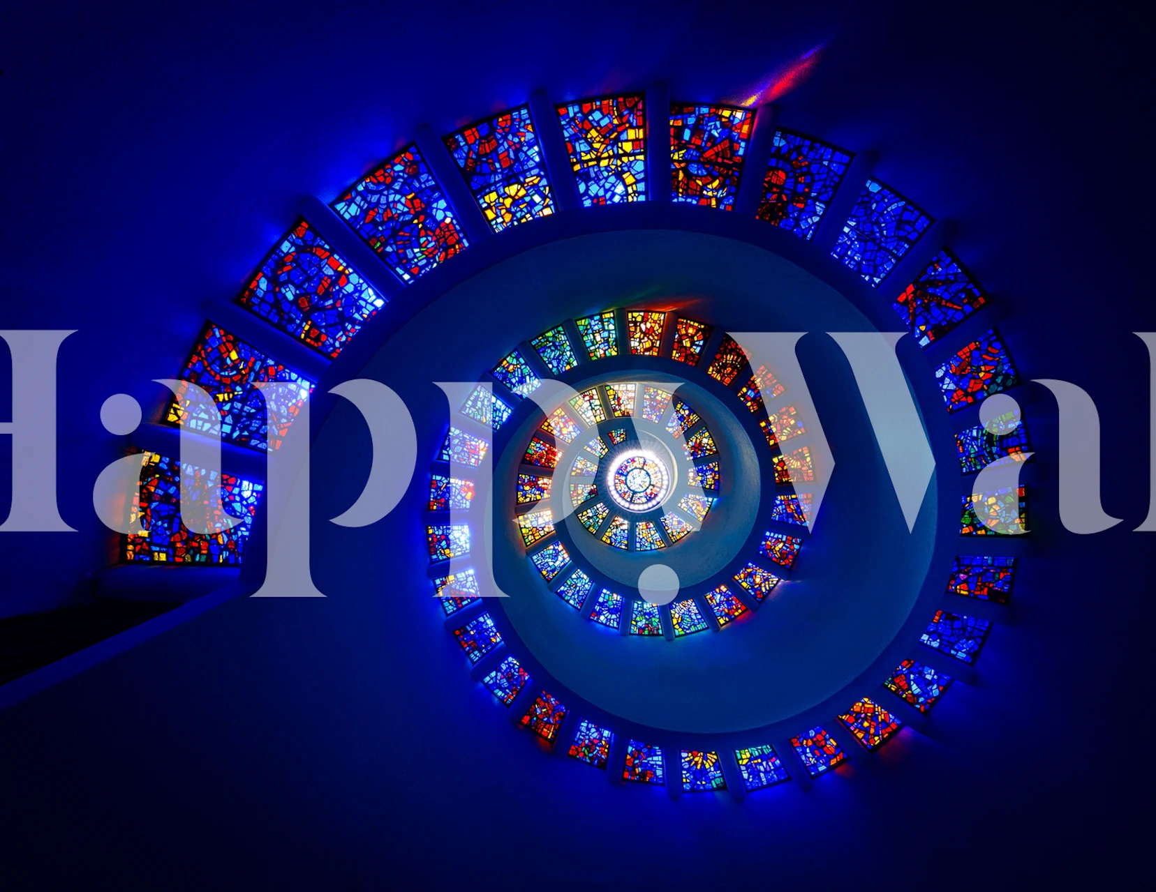 Spiral stained glass design with vibrant colors wallpaper