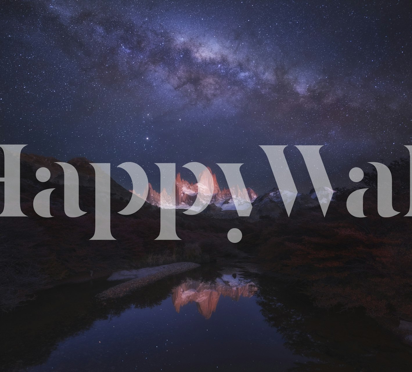 Patagonia mountain range κάτω από έναν αστρό-filled νυχτερινό ουρανό με αντανάκλαση στο νερό