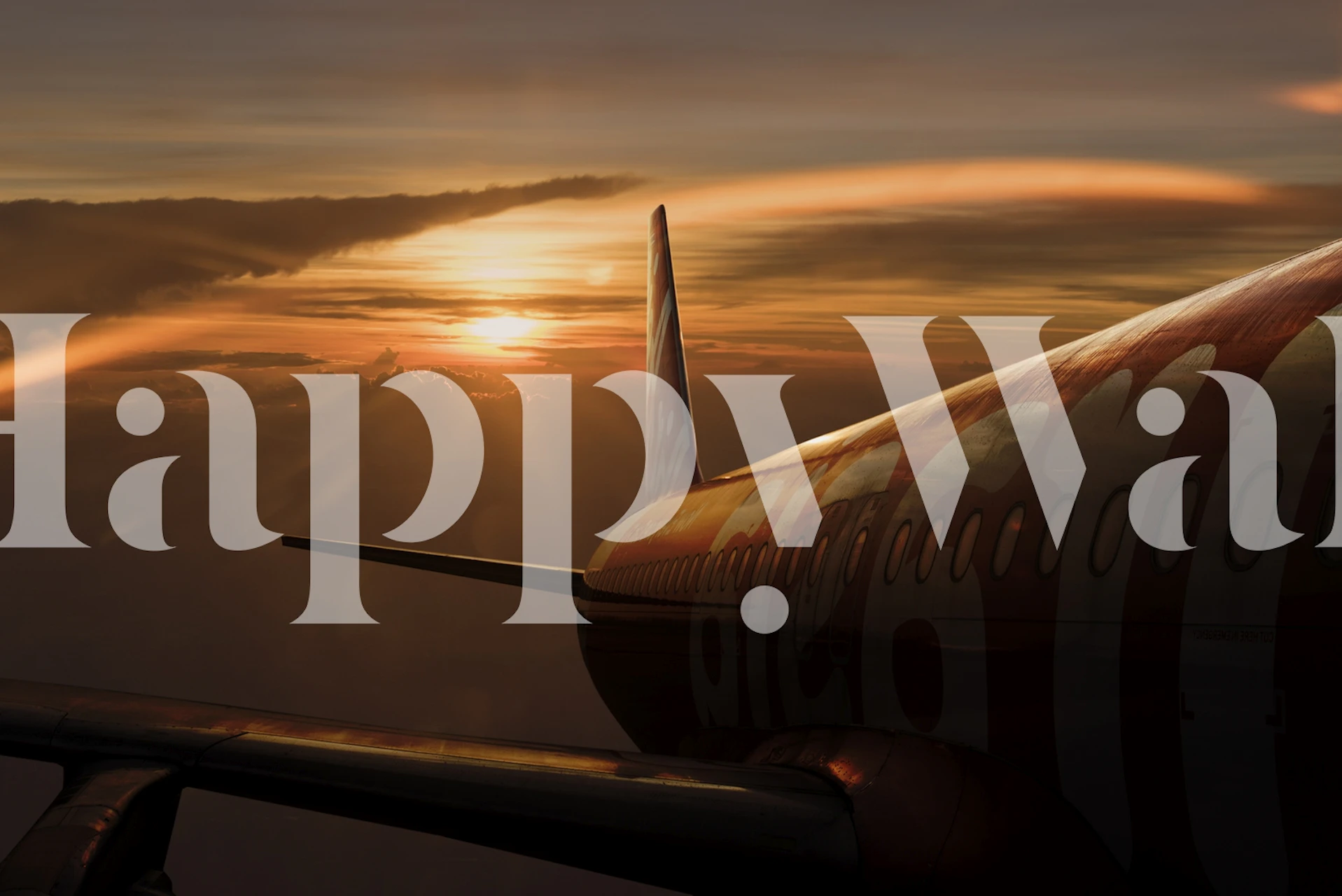 Asa do avião ao pôr do sol