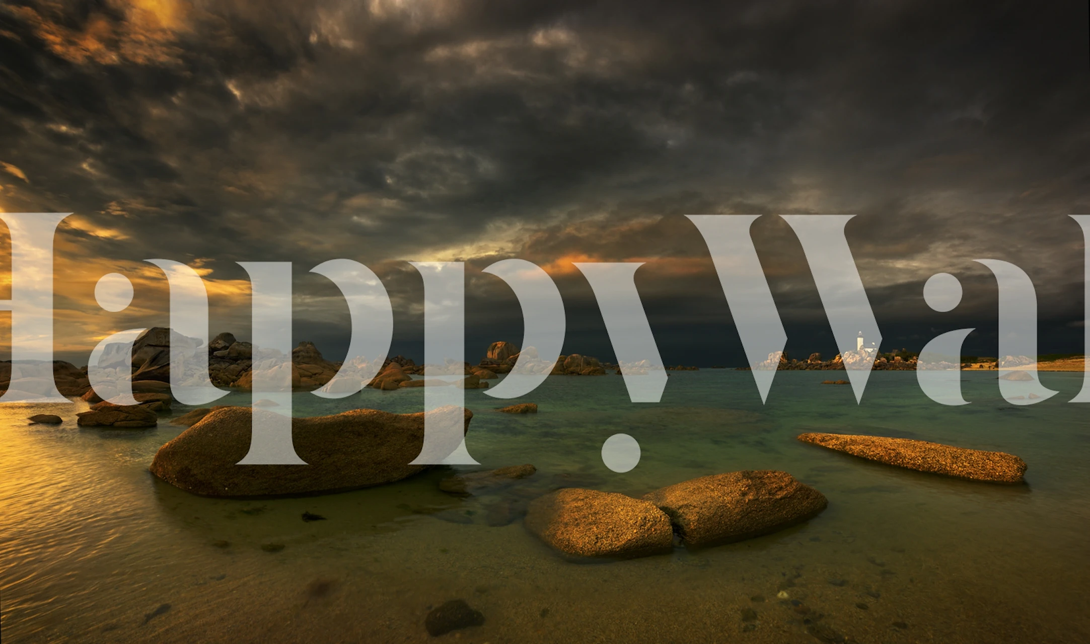 Stormy seascape wallpaper featuring dark clouds and light reflections