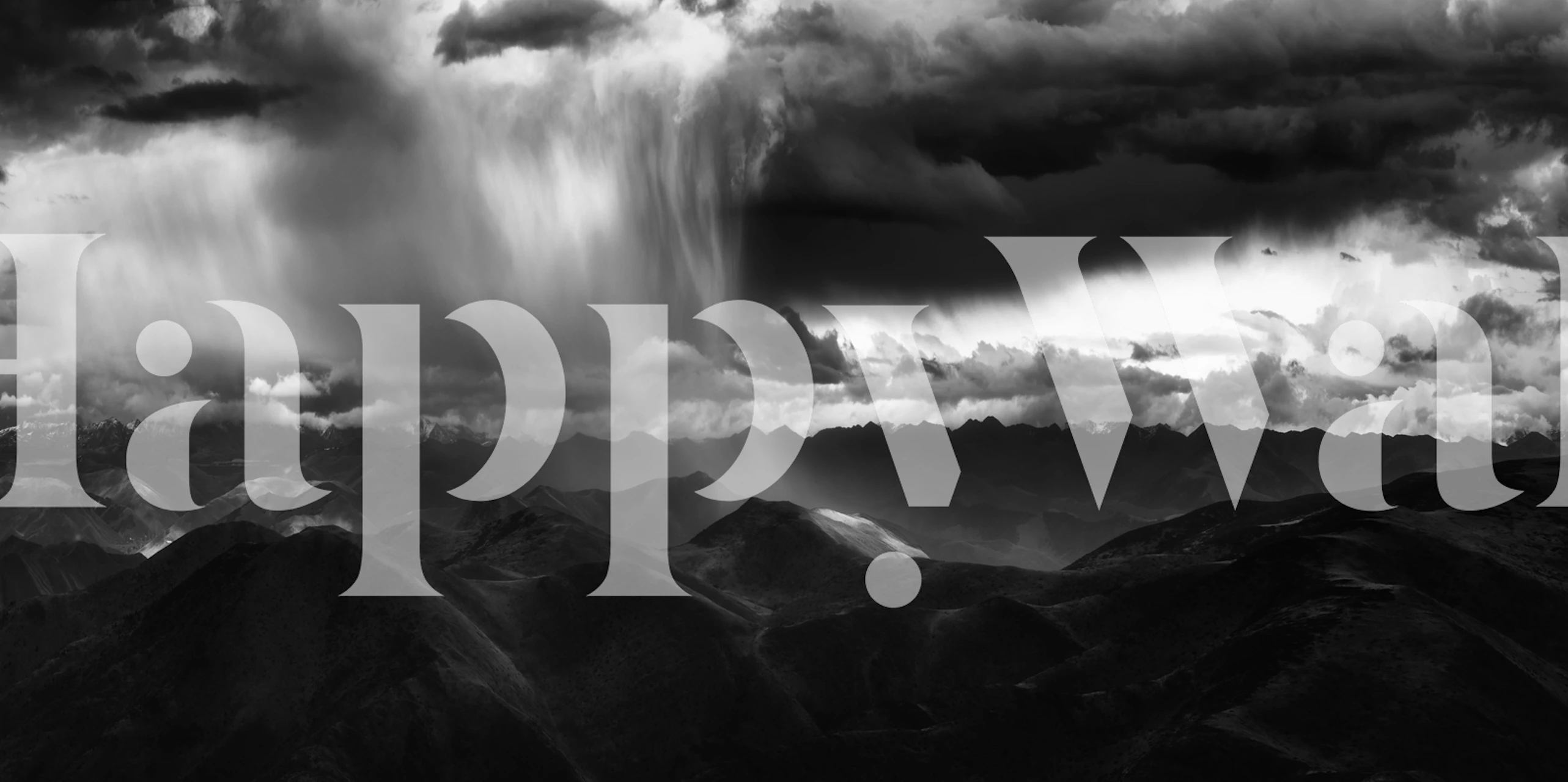 Black and white mountain landscape with dramatic rain clouds wallpaper