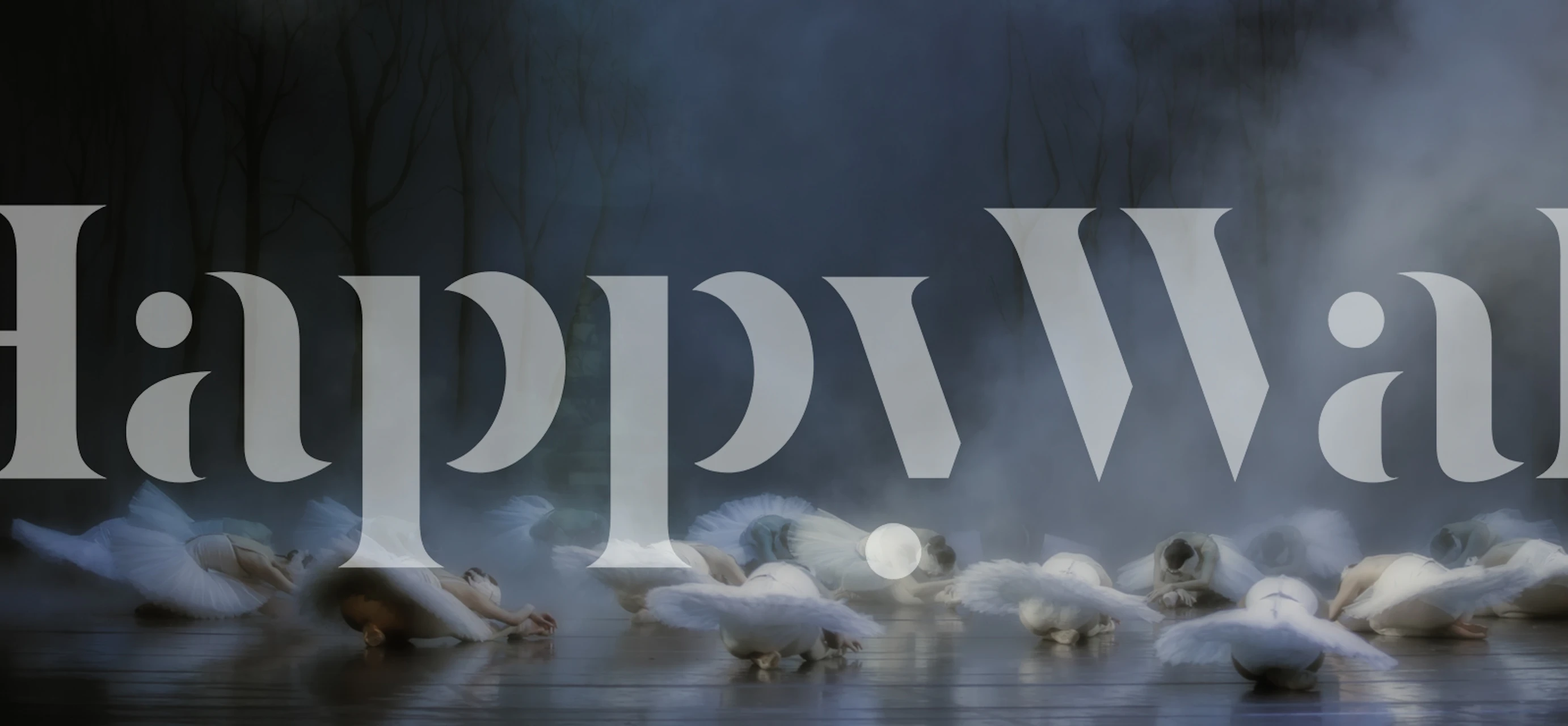 A serene scene of white swans on a misty lake wallpaper