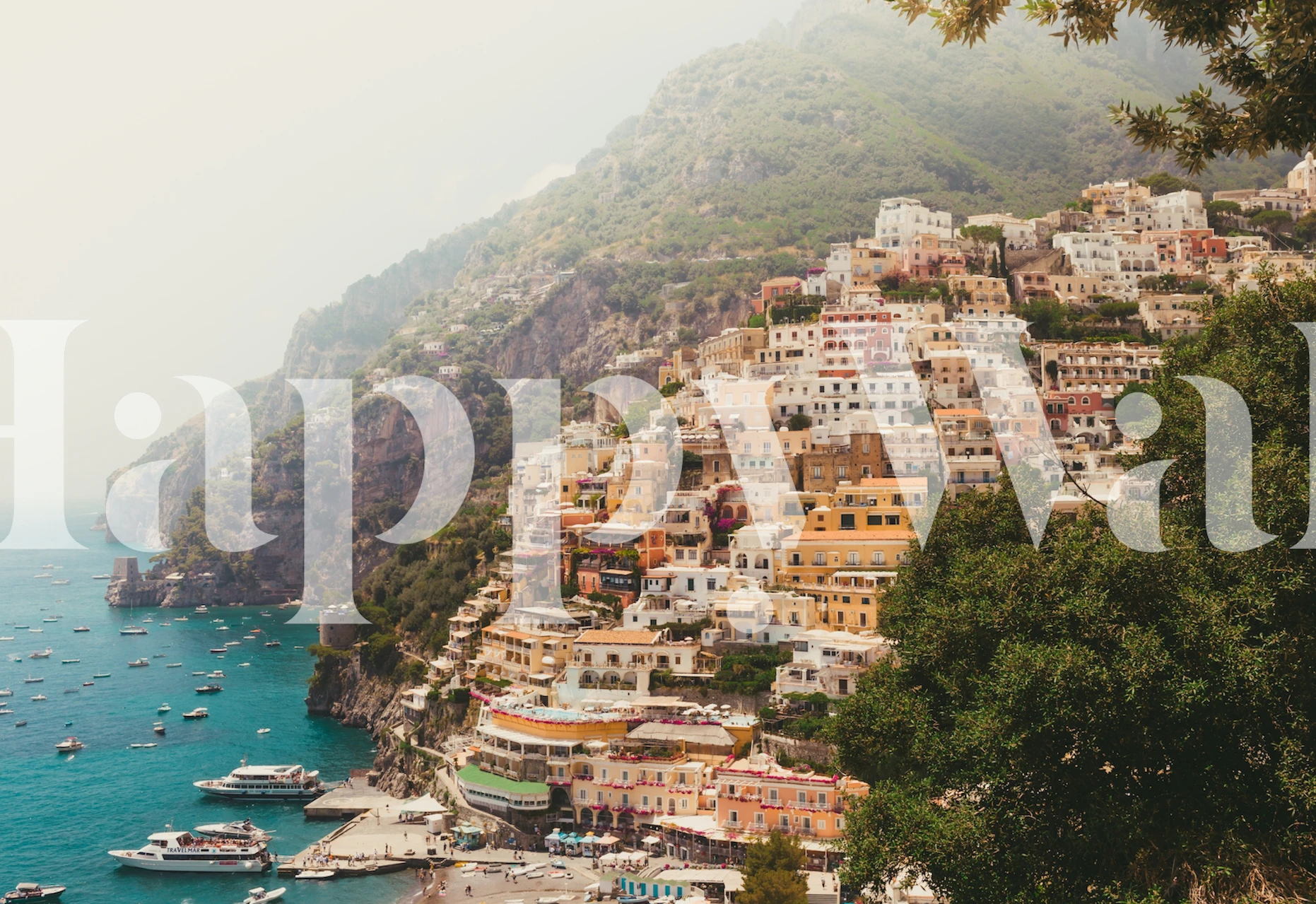 Colorful Amalfi Coast view with boats and houses wallpaper