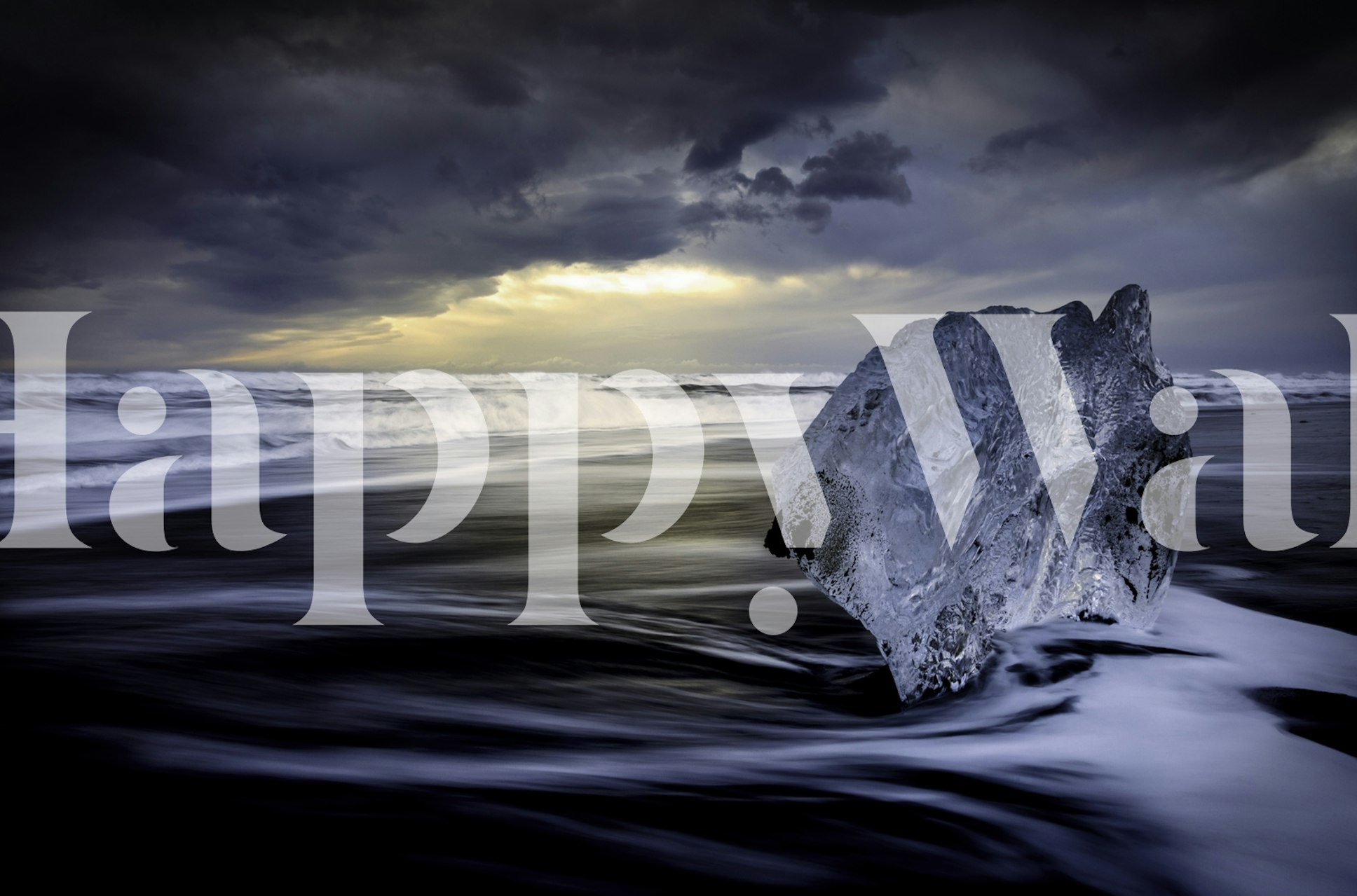 Large ice block on dark shore under cloudy sky wallpaper