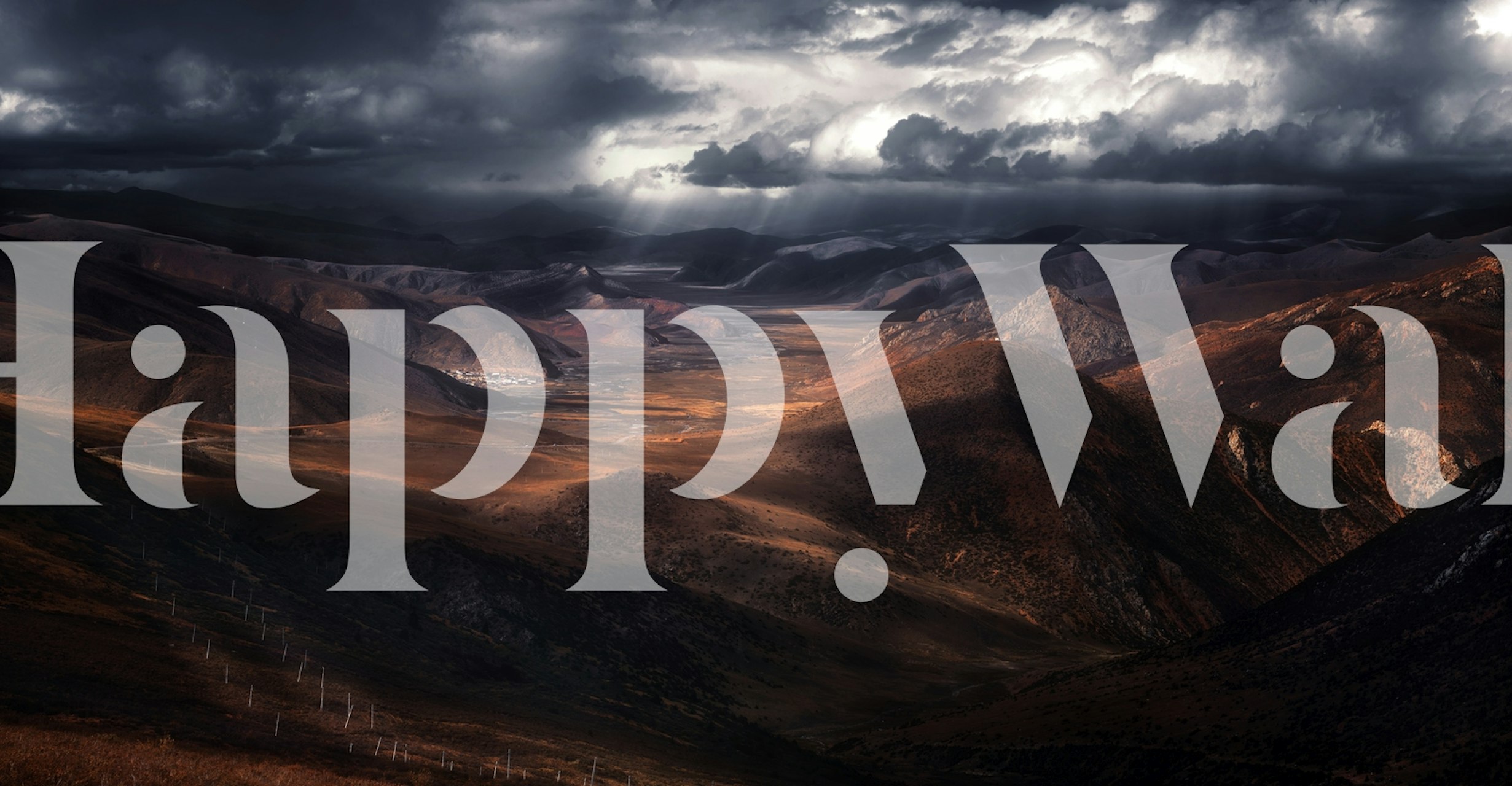 Dramatic highland landscape wall mural with a focus on natural beauty and atmospheric light