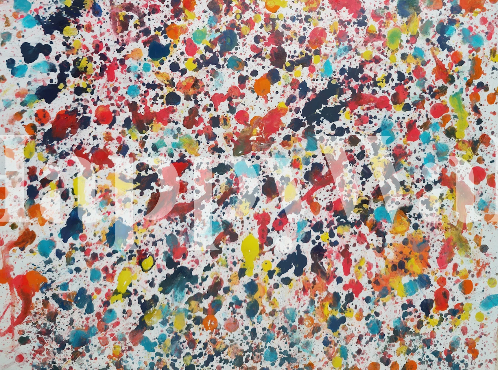 Colorful paint splashes in red, blue, yellow, and green abstract wallpaper