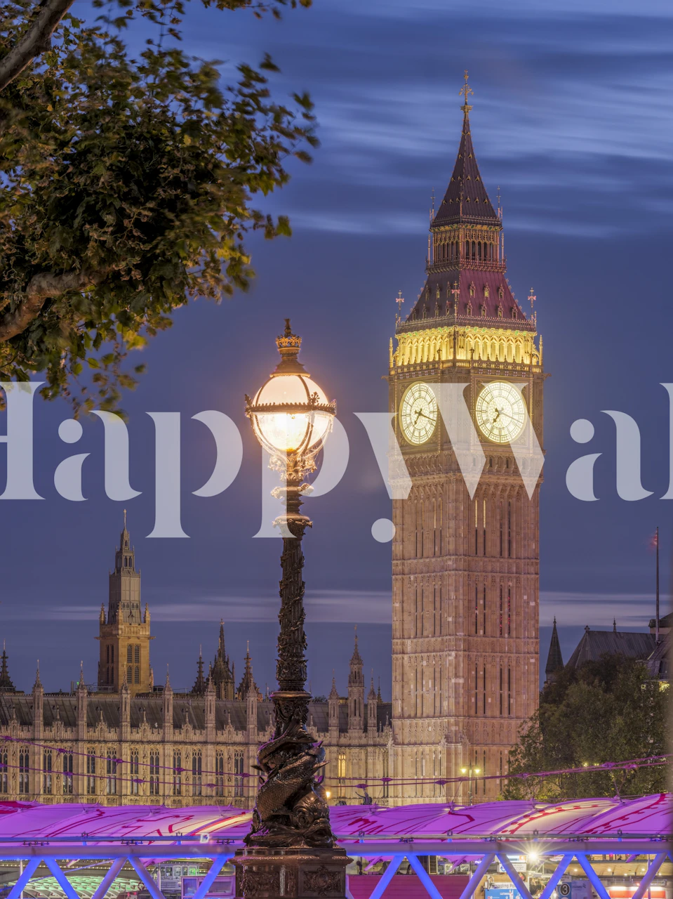 Night view of Big Ben and historic buildings against a blue sky wallpaper