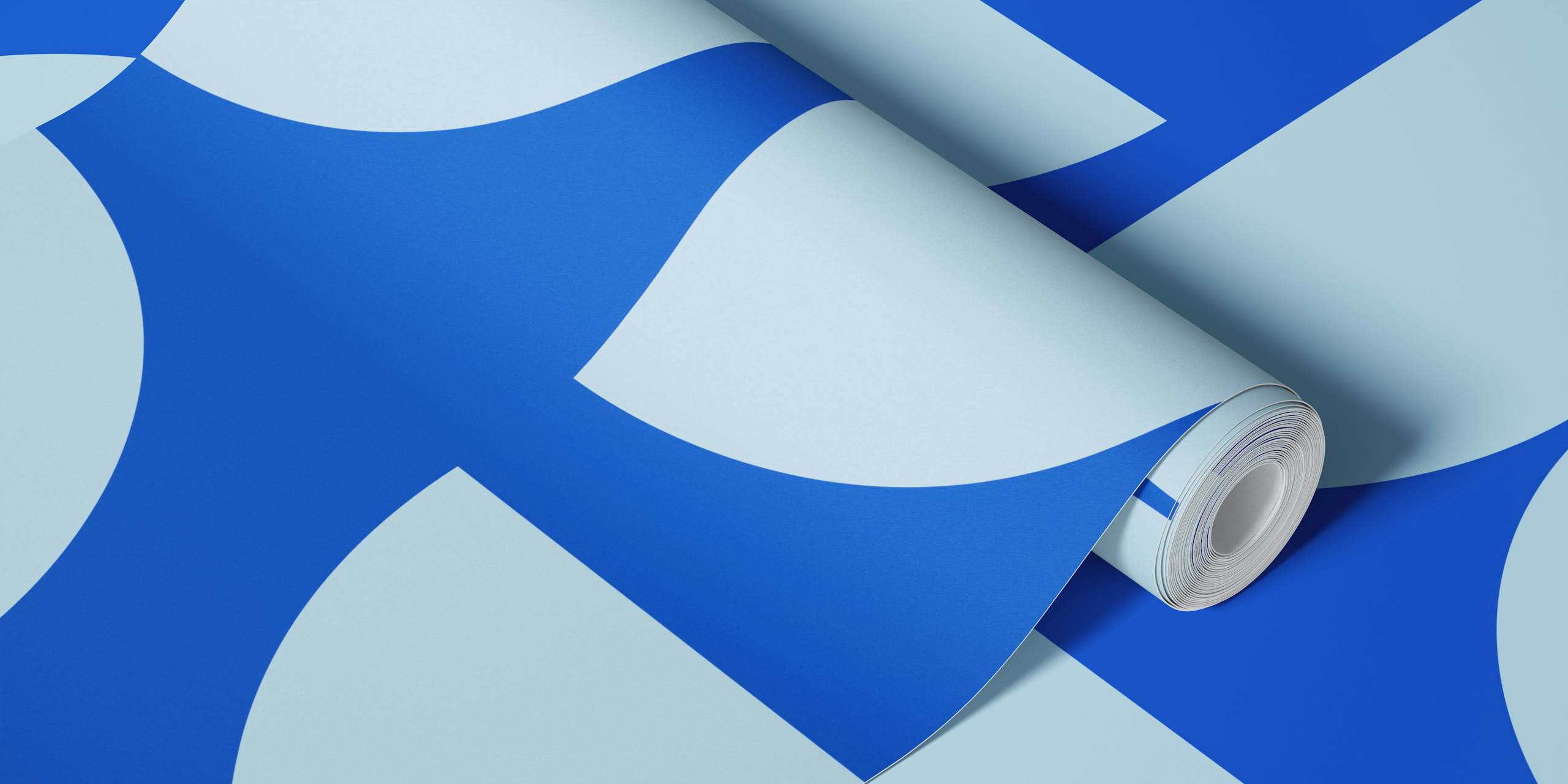 Modern blue geometric wallpaper in a room