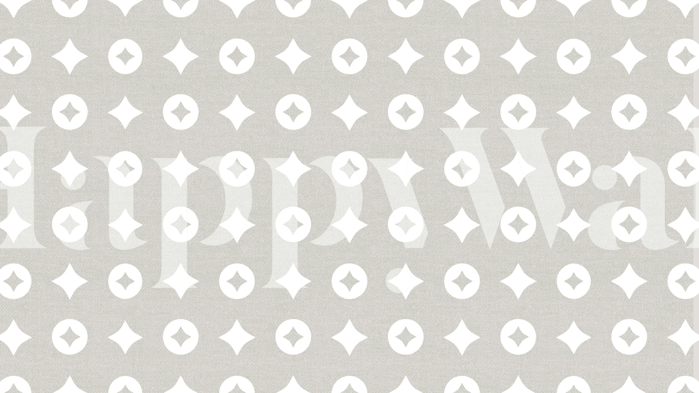 Geometric starburst patterns in gray and white wallpaper