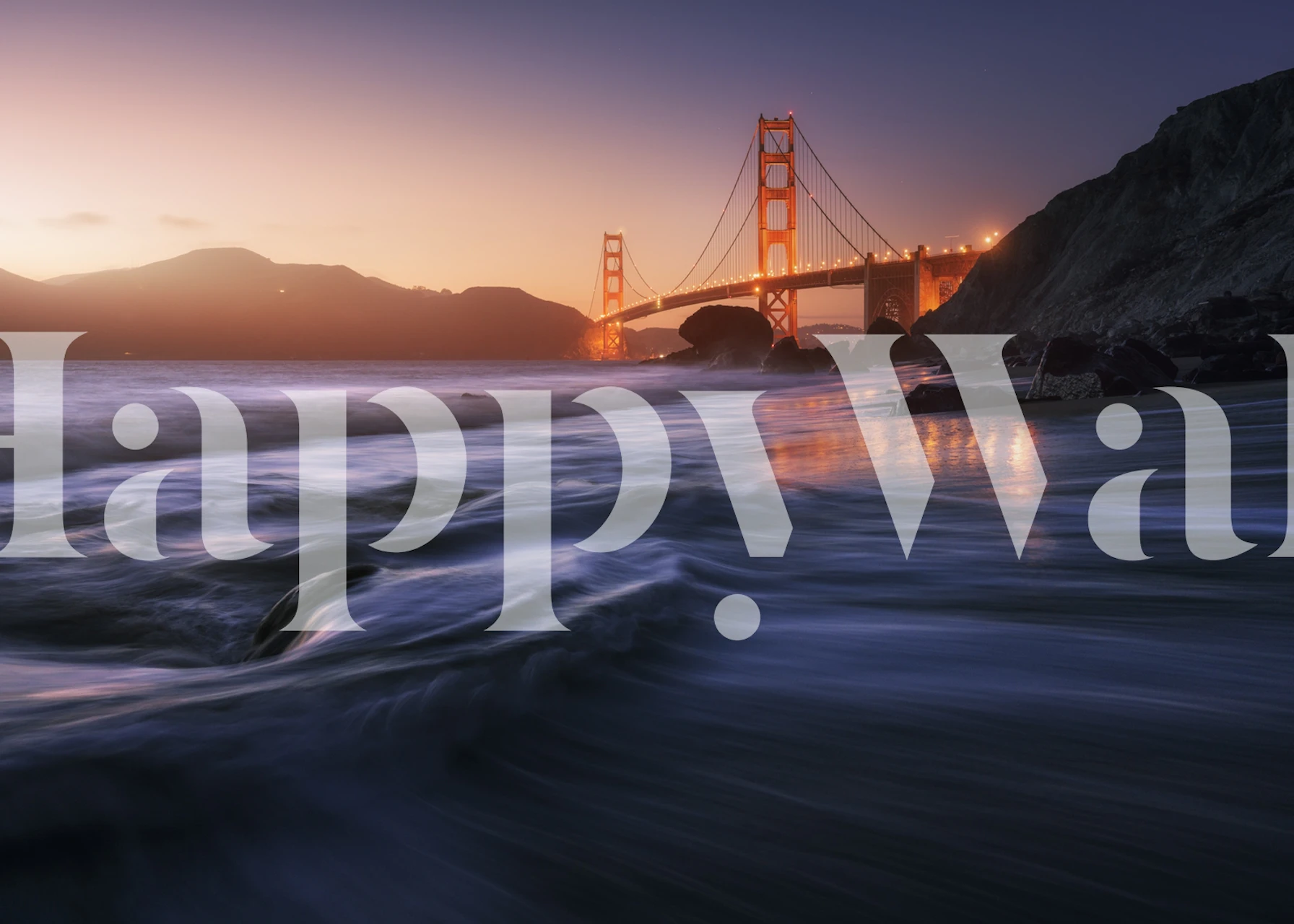 Golden beach with ocean waves and sunset colors wallpaper