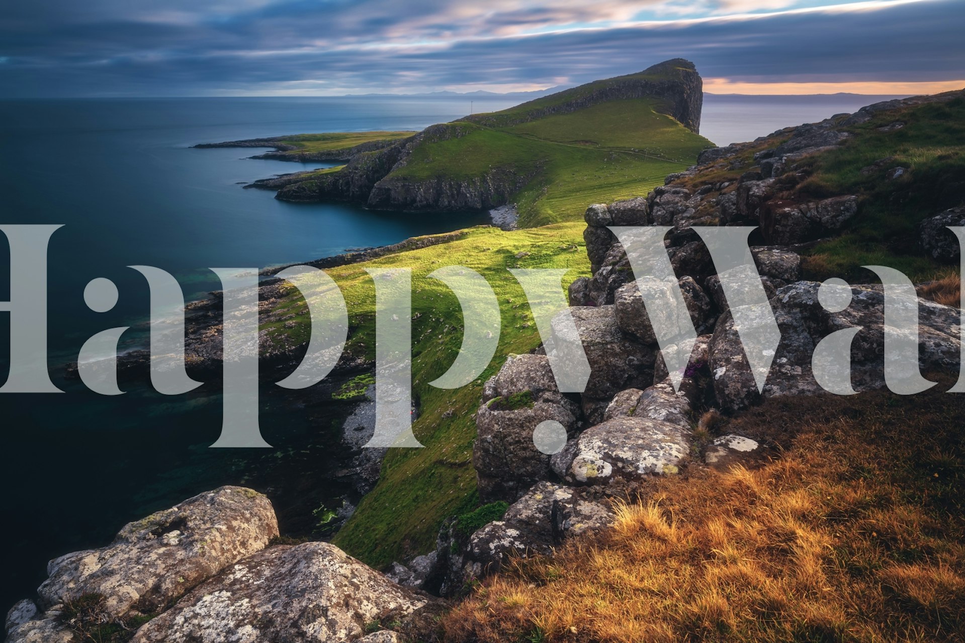 Coastal landscape with cliffs and ocean in green and blue wallpaper
